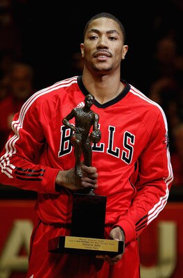CHICAGO, IL - MAY 04: Derrick Rose #1 of the Chicago Bulls holds the Maurice Podoloff Trophy awarded to the NBA Most Valuable Player before taking on the Atlanta Hawks in Game Two of the Eastern Conference Semifinals in the 2011 NBA Playoffs at the United