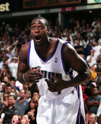 SACRAMENTO, CA- MAY 10:  Chris Webber #4 of the Sacramento Kings reacts to the referee's call as Kevin Garnett #21 of the Minnesota Timberwolves looks on during game 3 of the Western Conference Semifinal of the NBA Playoffs at Arco Arena on May 10, 2004  
