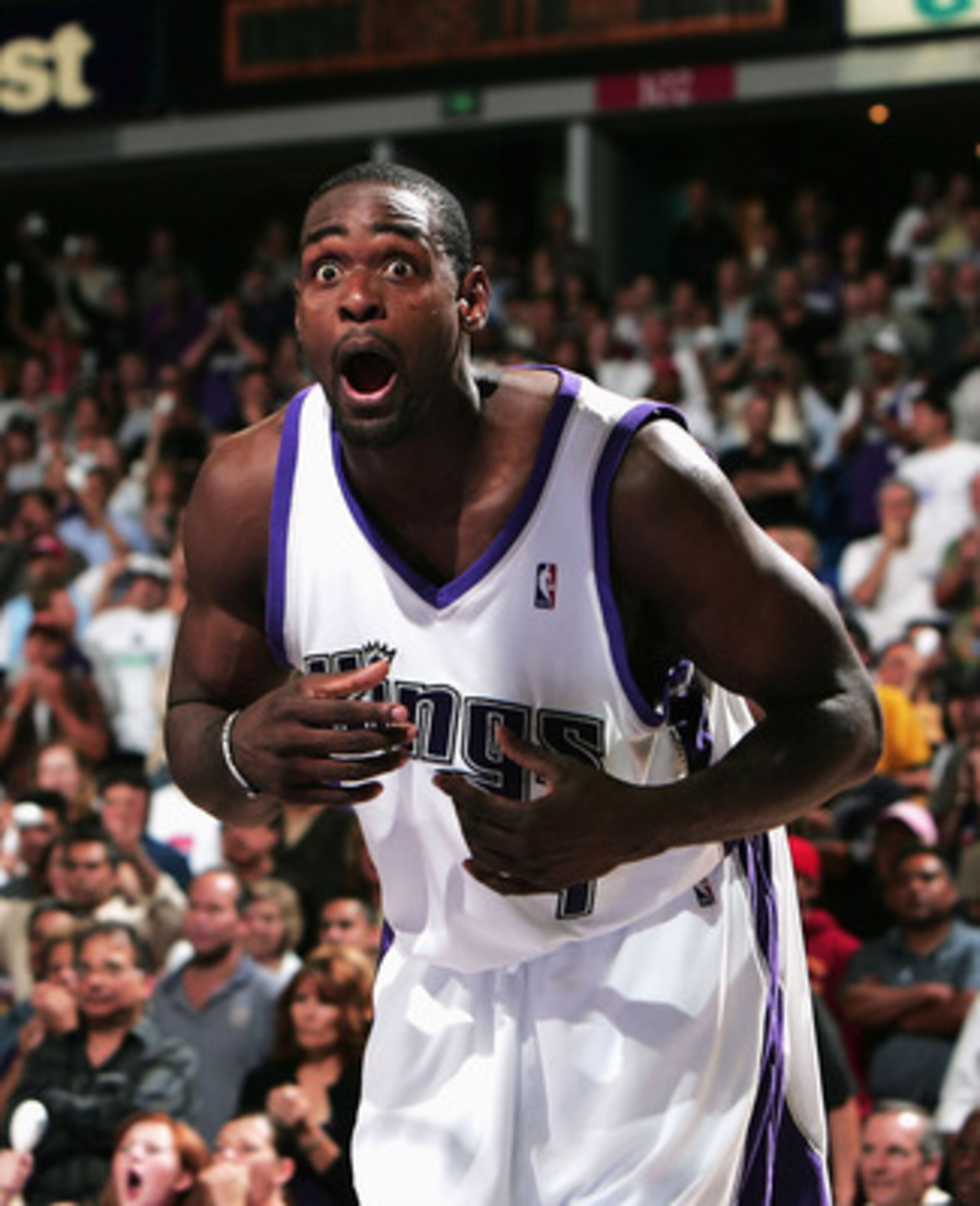 SACRAMENTO, CA- MAY 10:  Chris Webber #4 of the Sacramento Kings reacts to the referee's call as Kevin Garnett #21 of the Minnesota Timberwolves looks on during game 3 of the Western Conference Semifinal of the NBA Playoffs at Arco Arena on May 10, 2004  