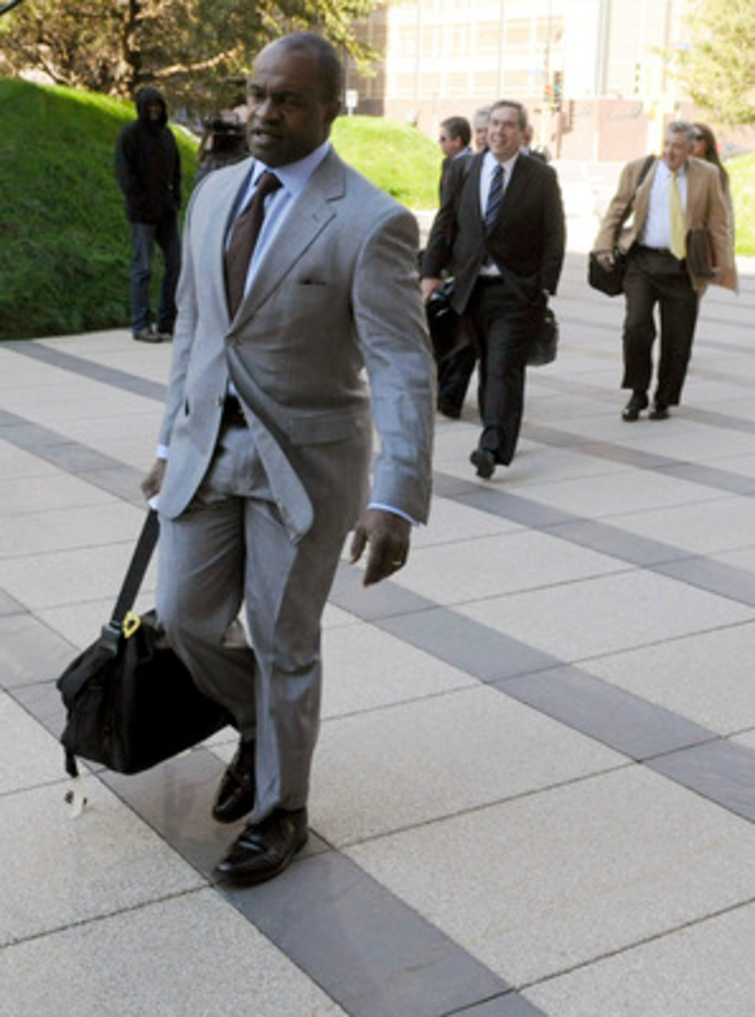 MINNEAPOLIS, MN - MAY 17: Former NFL Players Association executive director DeMaurice Smith and the NFL players' lawyers arrive for court ordered mediation at the U.S. Courthouse on May 17, 2011 in Minneapolis, Minnesota. As the NFL lockout remains in pla