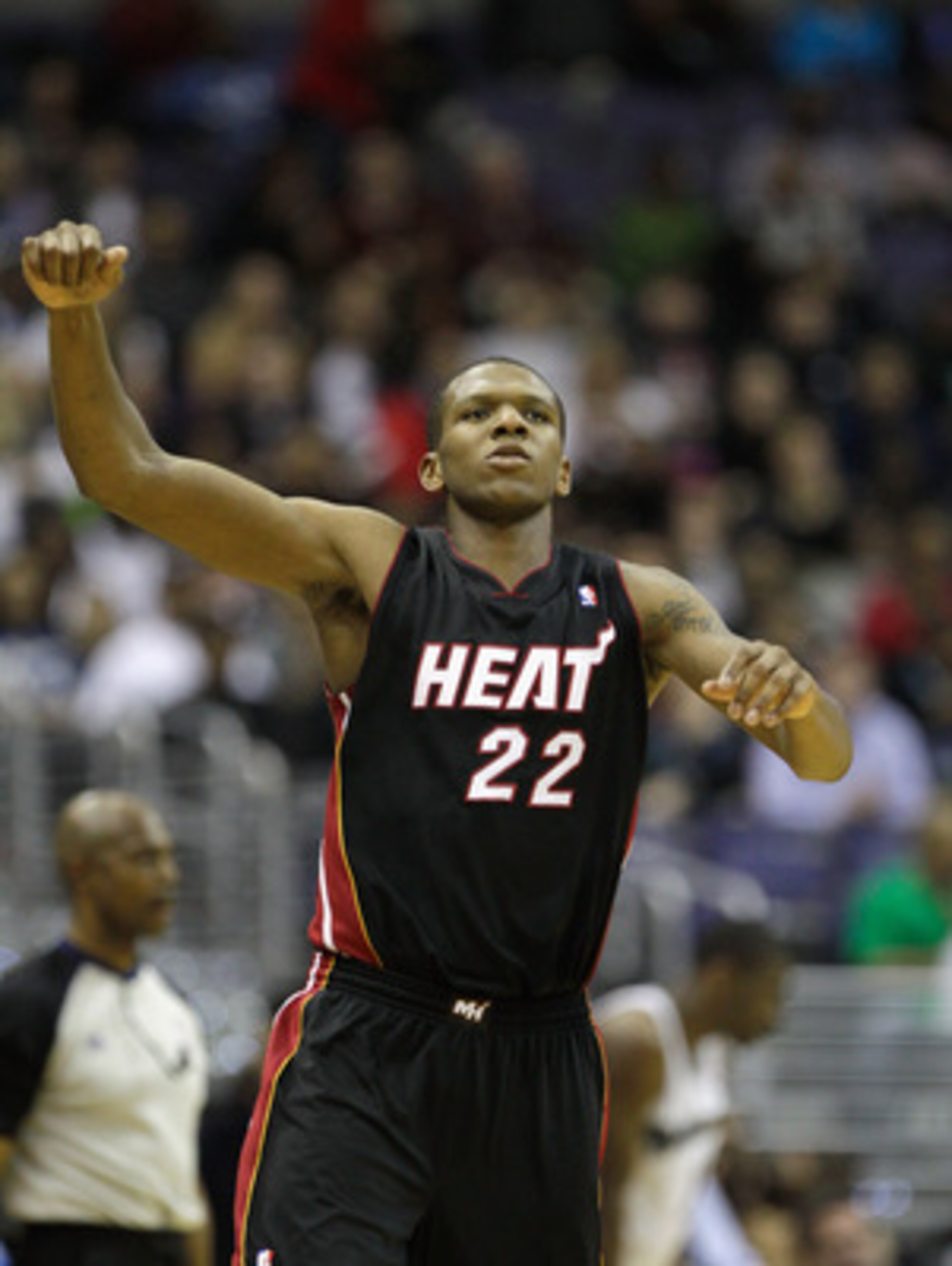 WASHINGTON, DC - MARCH 30:  James Jones #22 of the Miami Heat celebrates after making a shot against the Washington Wizards at the Verizon Center on March 30, 2011 in Washington, DC. NOTE TO USER: User expressly acknowledges and agrees that, by downloadin