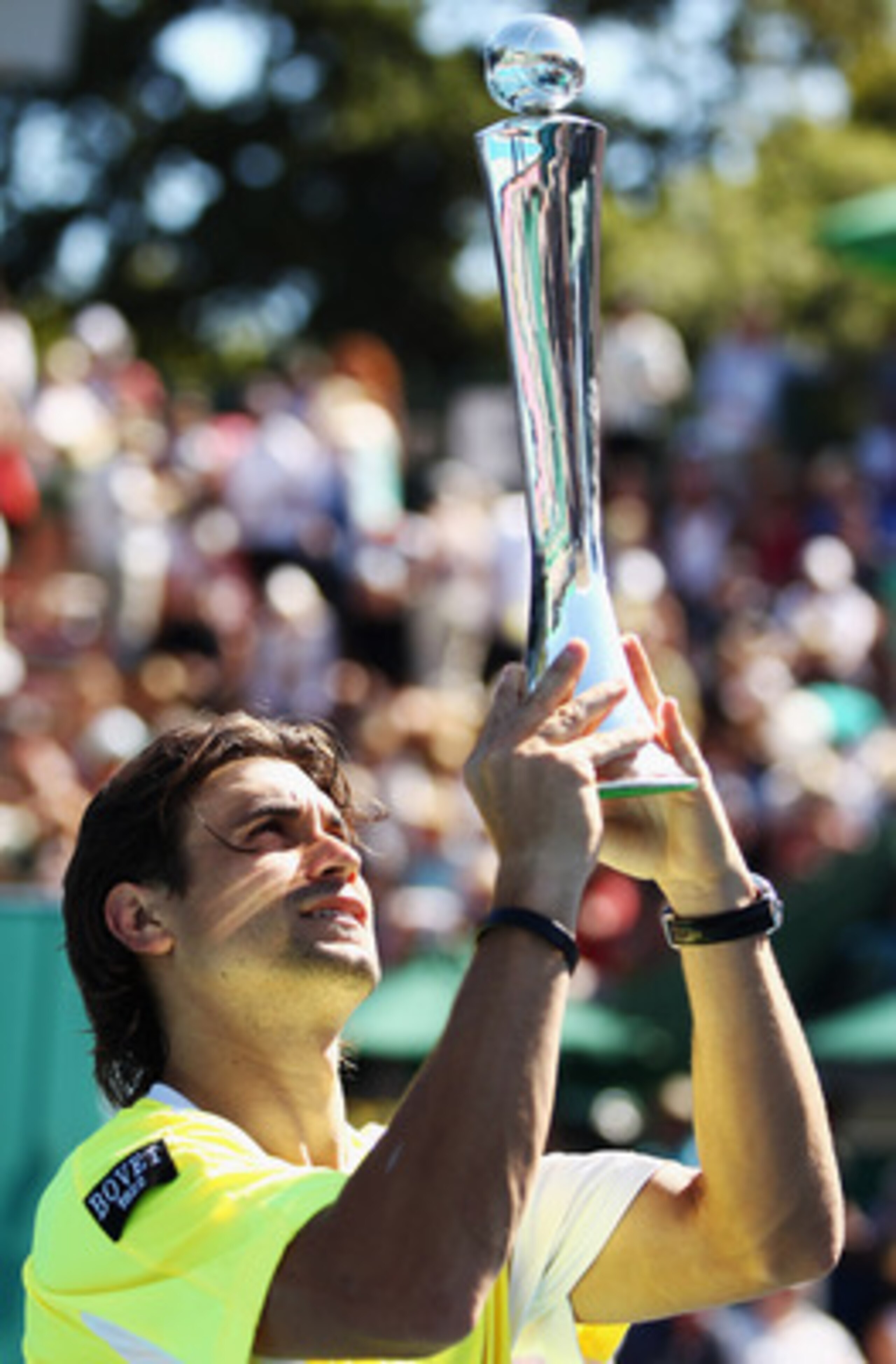 AUCKLAND, NEW ZEALAND - JANUARY 15:  David Ferrer of Spain holds up the Heineken Open trophy after winning the Men's Final match against David Nalbandian of Argentina on day six of the Heineken Open at ASB Tennis Centre on January 15, 2011 in Auckland, Ne