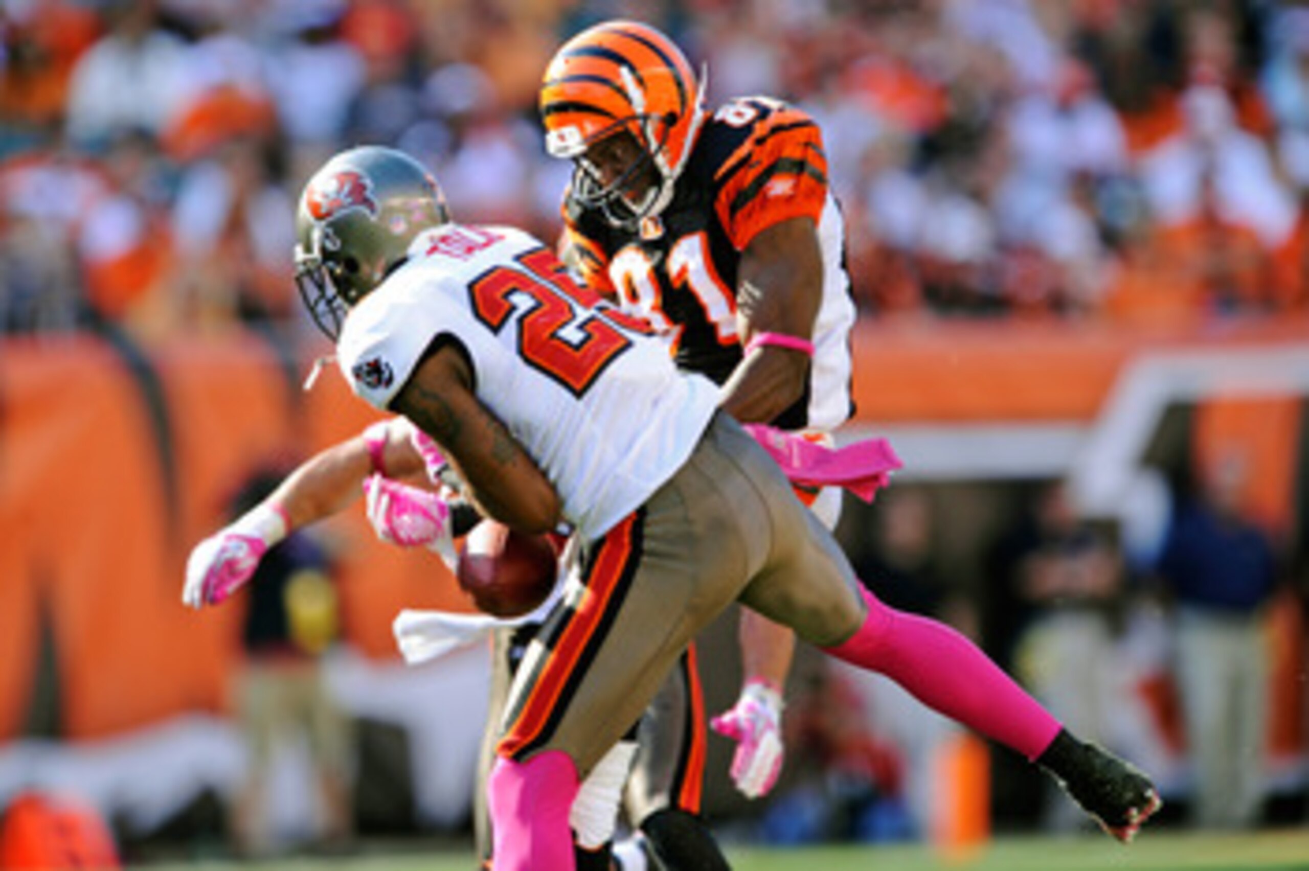 CINCINNATI, OH - OCTOBER 10:  Aqib Talib #25 of the Tampa Bay Buccaneers steps in front of Terrell Owens #81 of the Cincinnati Bengals to make an interception at Paul Brown Stadium on October 10, 2010 in Cincinnati, Ohio. Tampa Bay intercepted the Bengals