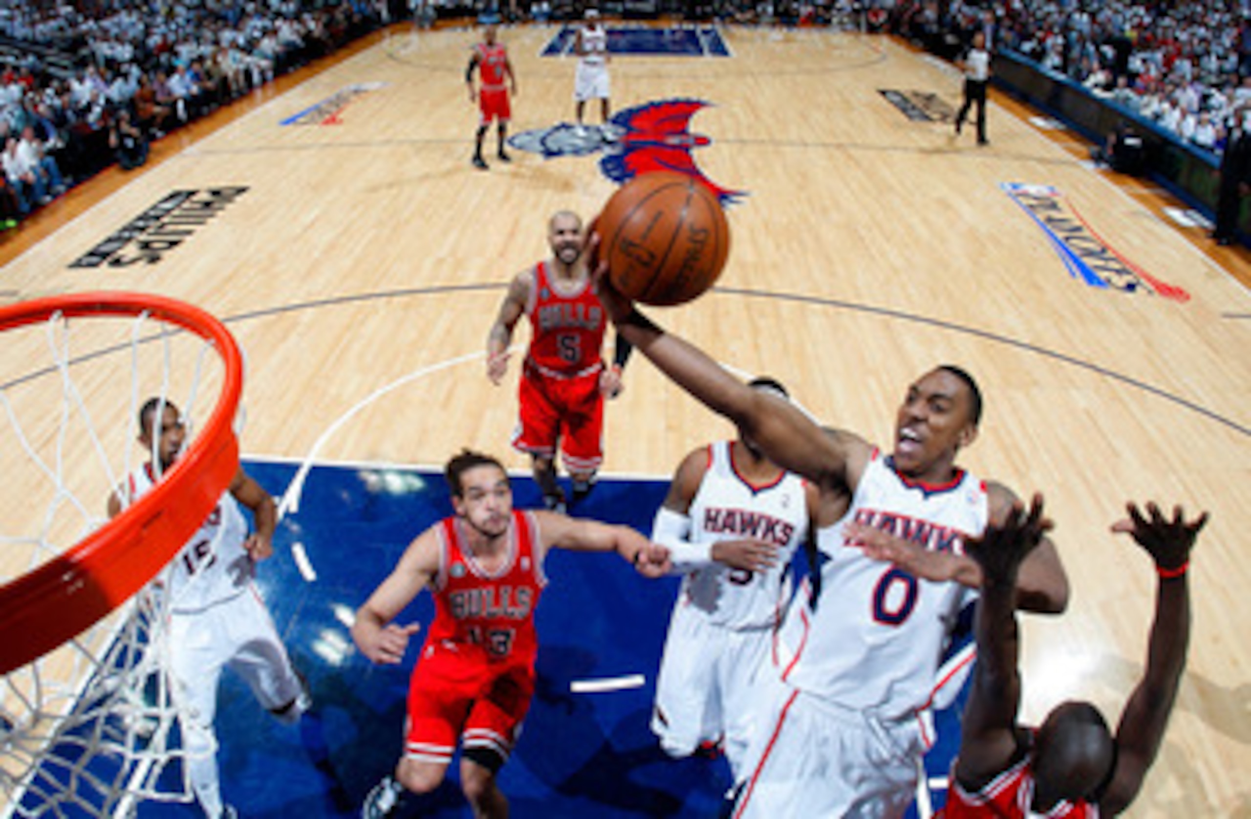 ATLANTA, GA - MAY 06:  Jeff Teague #0 of the Atlanta Hawks drives to the basket against the Chicago Bulls in Game Three of the Eastern Conference Semifinals in the 2011 NBA Playoffs at Phillips Arena on May 6, 2011 in Atlanta, Georgia.  NOTE TO USER: User