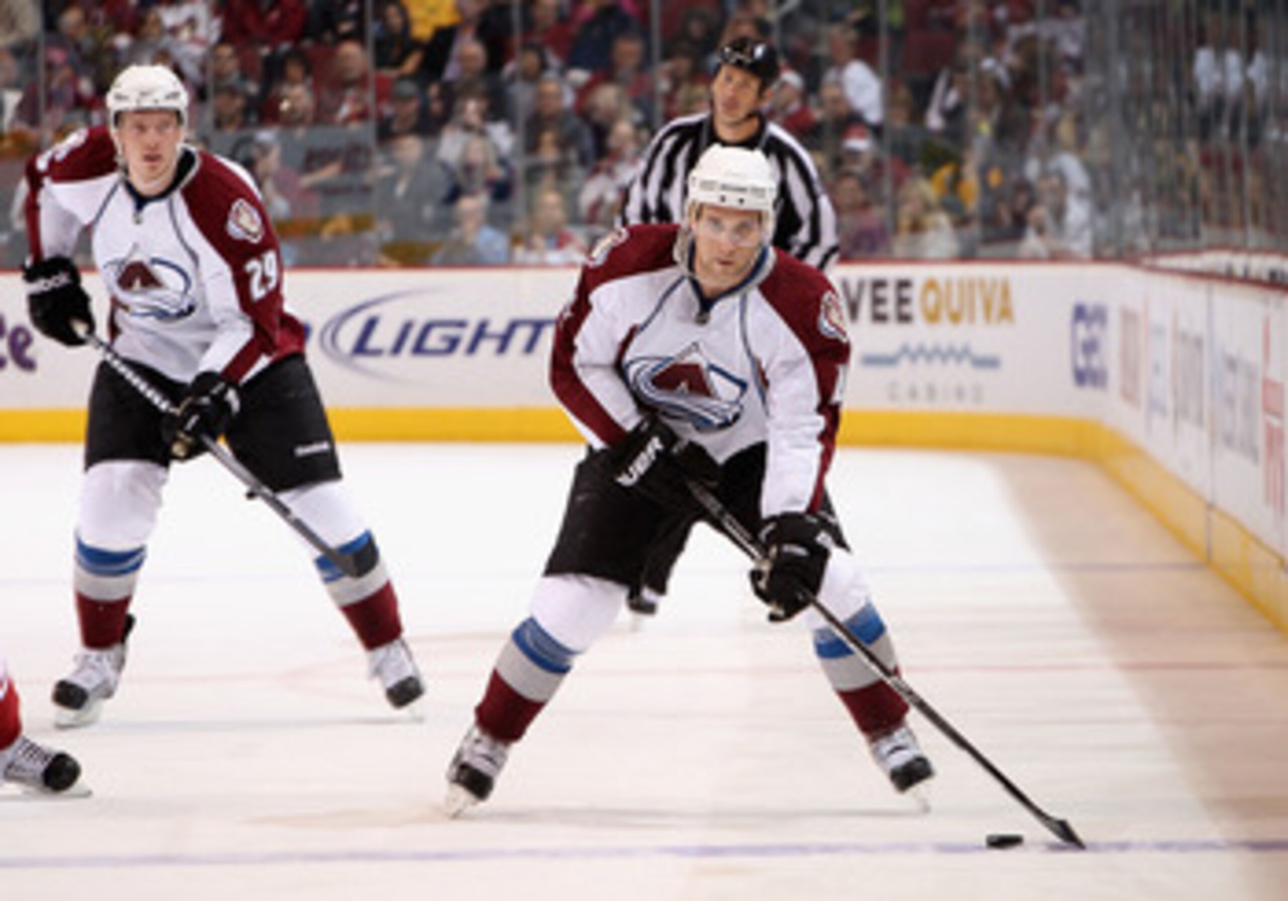 GLENDALE, AZ - APRIL 01:  John-Michael Liles #4 of the Colorado Avalanche skates with the puck during the NHL game against the Phoenix Coyotes at Jobing.com Arena on April 1, 2011 in Glendale, Arizona.  The Avalanche defeated the Coyotes 4-3 in an overtim