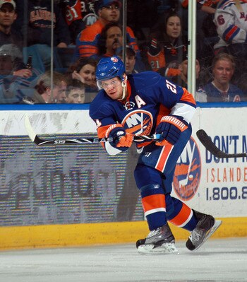 UNIONDALE, NY - MARCH 31:  Kyle Okposo #21 of the New York Islanders skates against the New York Rangers at the Nassau Coliseum on March 31, 2011 in Uniondale, New York.  (Photo by Bruce Bennett/Getty Images)