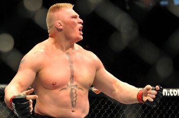 LAS VEGAS - JULY 11:  Brock Lesnar reacts after knocking out Frank Mir during their heavyweight title bout during UFC 100 on July 11, 2009 in Las Vegas, Nevada.  (Photo by Jon Kopaloff/Getty Images)