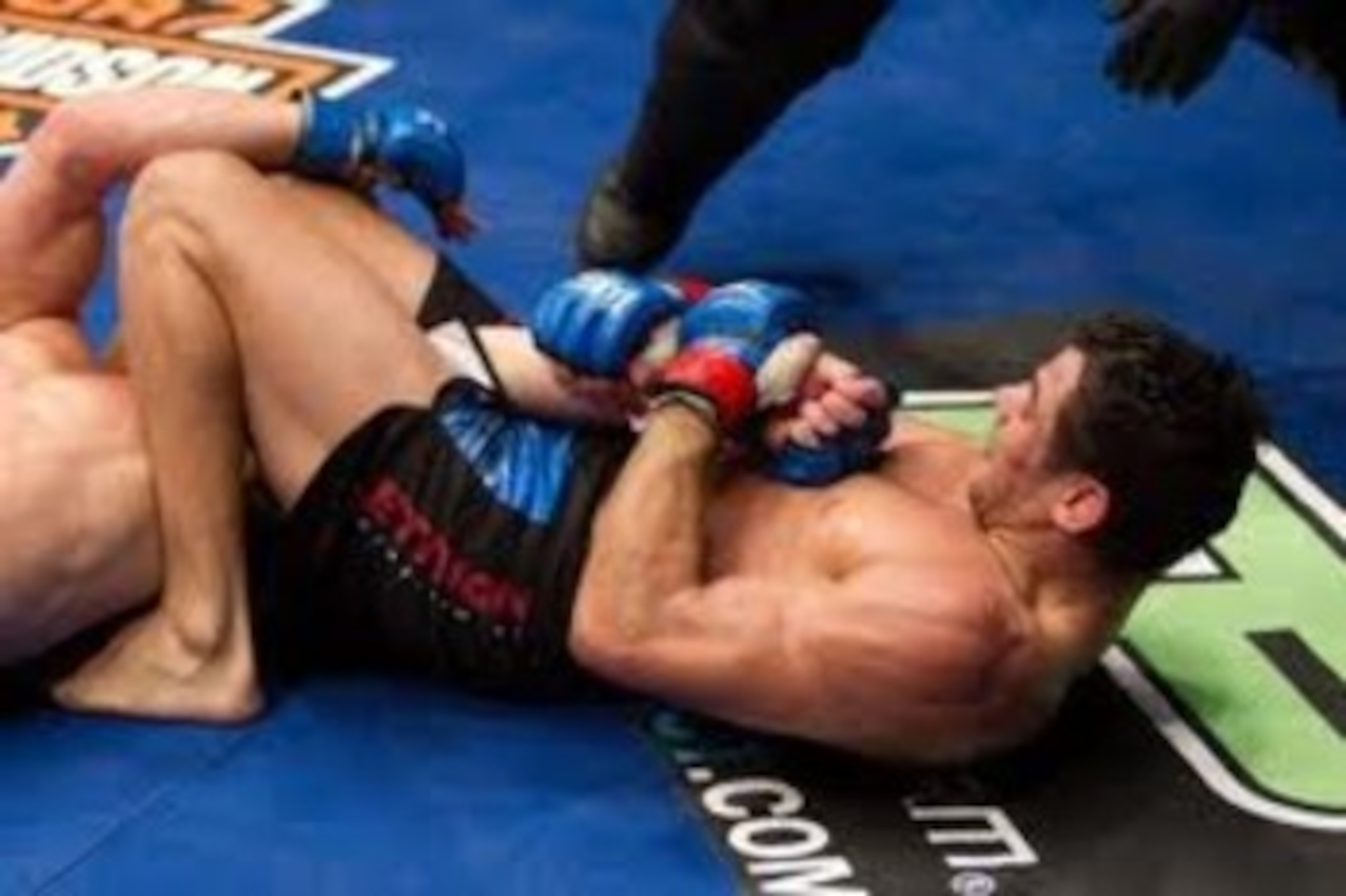 Renan Barao securing an arm-bar victory