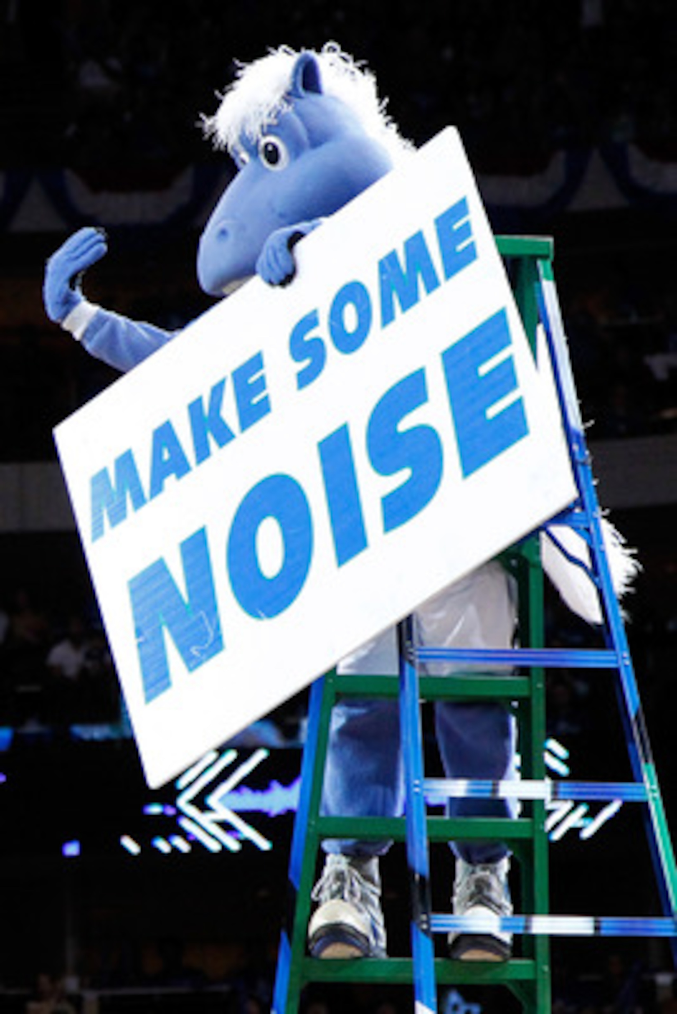 DALLAS, TX - MAY 17:  The Dallas Mavericks mascot stands on a ladder and holds a sign as the Mavericks take on the Oklahoma City Thunder in Game One of the Western Conference Finals during the 2011 NBA Playoffs at American Airlines Center on May 17, 2011 
