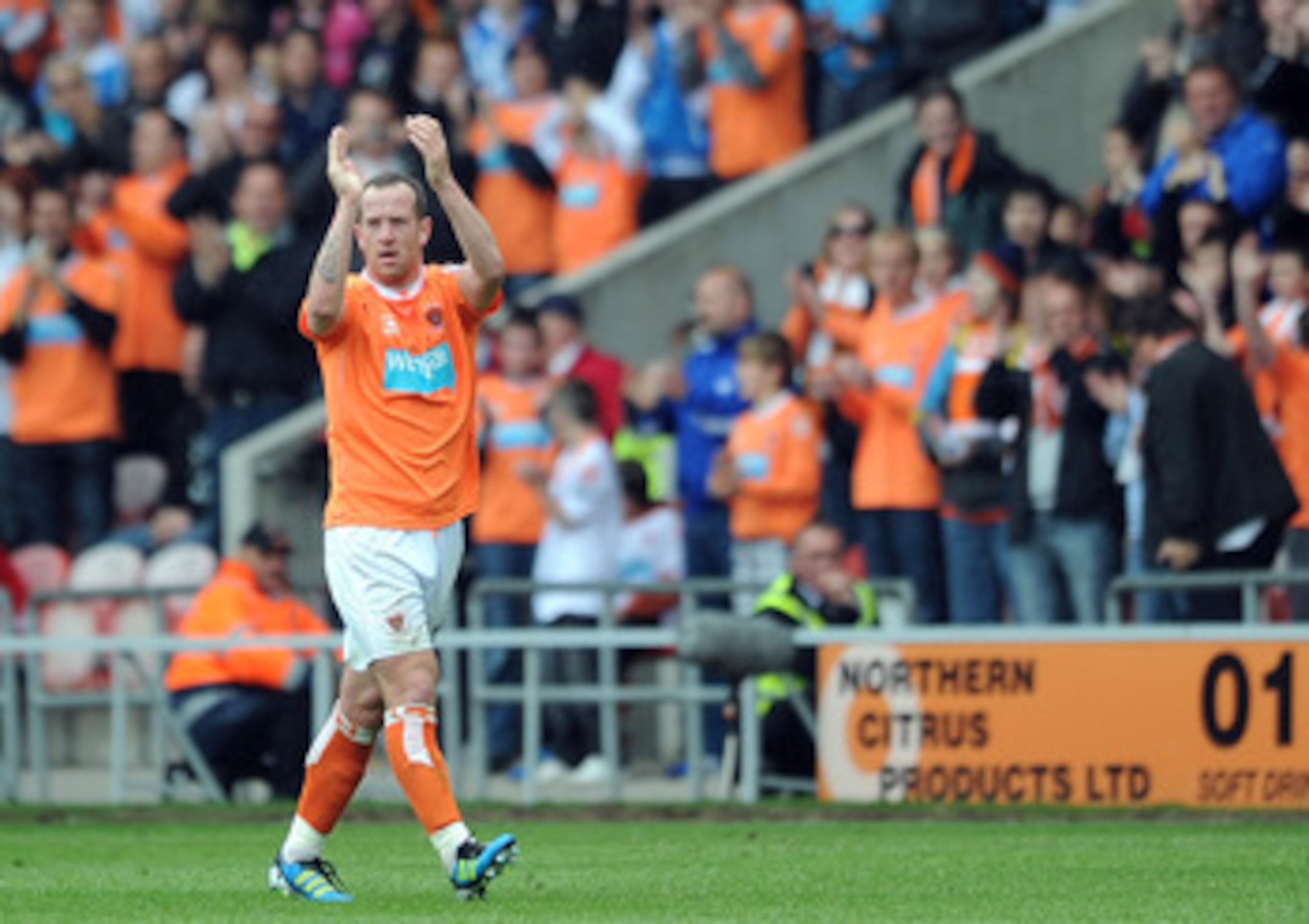 BLACKPOOL, ENGLAND - MAY 14:  Charlie Adam of Blackpool applauds the supporters as he leaves the field after being substituted during the Barclays Premier League match between Blackpool and Bolton Wanderers at Bloomfield Road on May 14, 2011 in Blackpool,