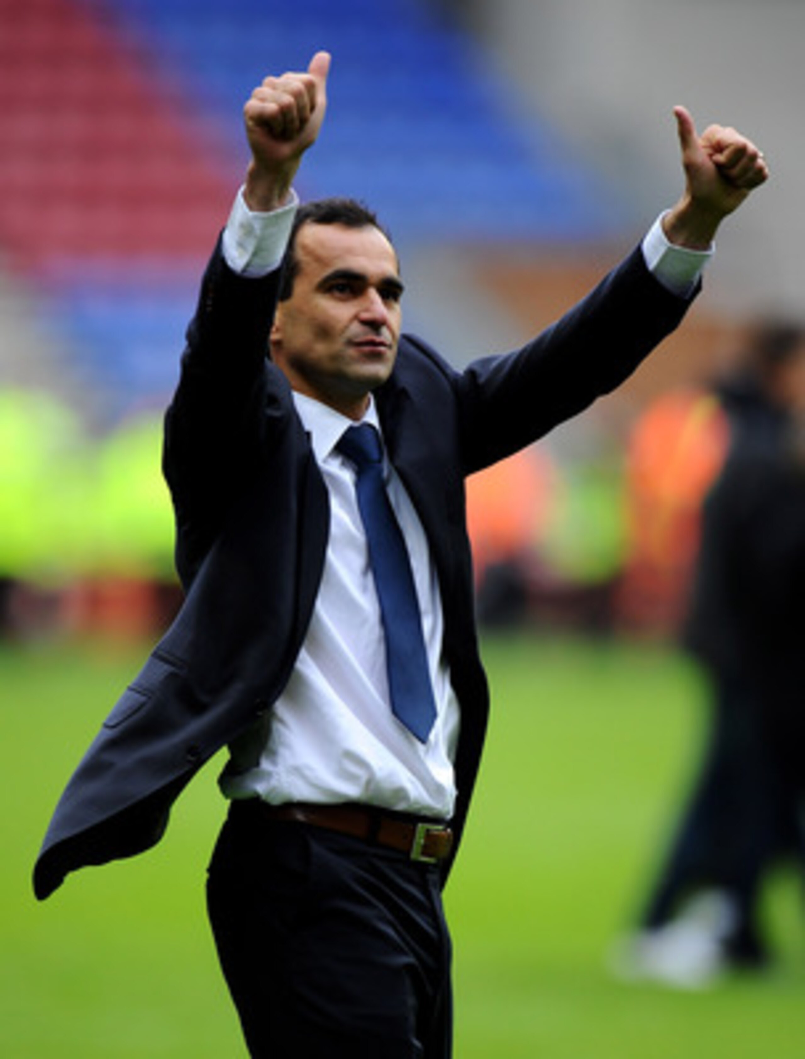 WIGAN, ENGLAND - MAY 15:  Wigan Athletic Manager Roberto Martinez salutes the fans at the end of the Barclays Premier League match between Wigan Athletic and West Ham United at the DW Stadium on May 15, 2011 in Wigan, England.  (Photo by Clive Mason/Getty