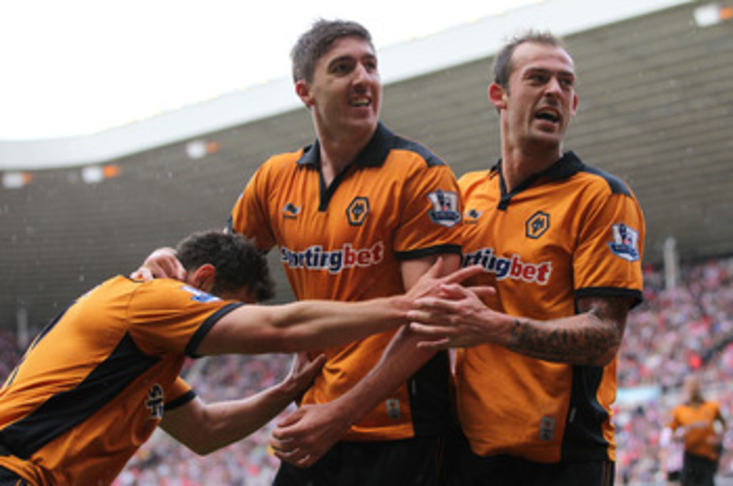 SUNDERLAND, ENGLAND - MAY 14:   Steven Fletcher of Wolverhampton Wanderers (R) celebrates after scoring during the Barclays Premier League match between Sunderland and Wolverhampton Wanderers at The Stadium of Light on May 14, 2011 in Sunderland, England.