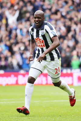 WEST BROMWICH, ENGLAND - MAY 14:  Youssouf Mulumbu of  West Bromwich Albion celebrates his goal during the Barclays Premier League match between West Bromwich Albion and Everton at The Hawthorns on May 14, 2011 in West Bromwich, England.  (Photo by Mark T