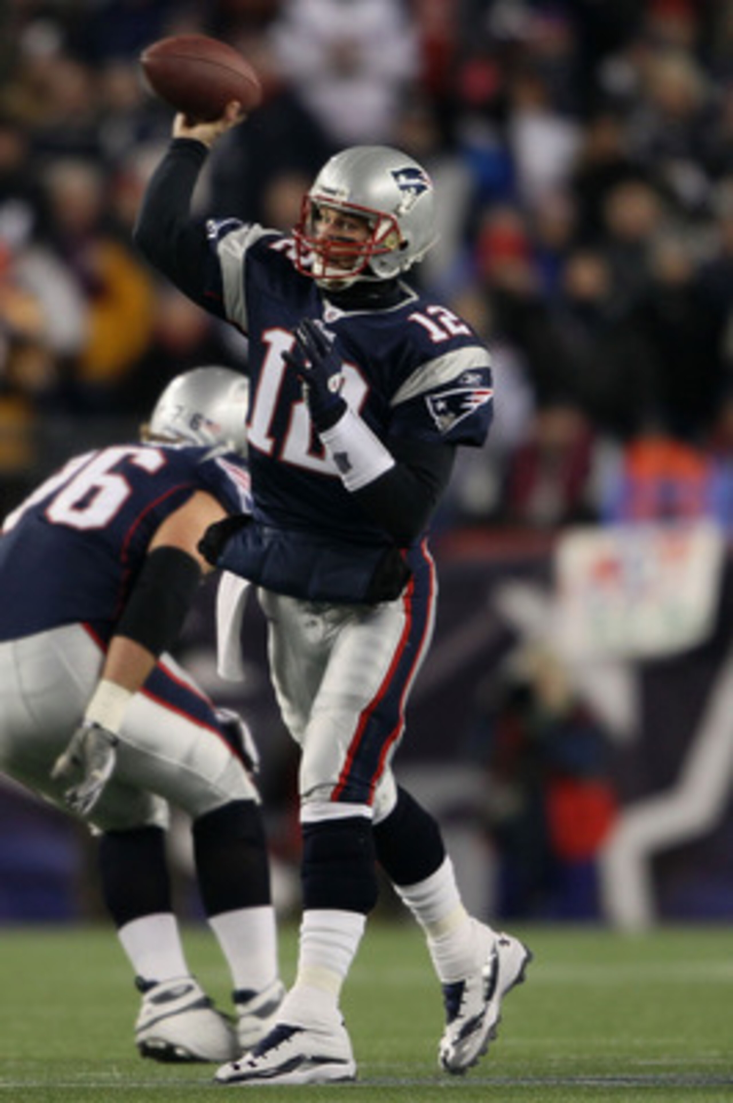 FOXBORO, MA - JANUARY 16:  Quarterback Tom Brady #12 of the New England Patriots throws a pass during their 2011 AFC divisional playoff game against the New York Jets at Gillette Stadium on January 16, 2011 in Foxboro, Massachusetts.  (Photo by Elsa/Getty