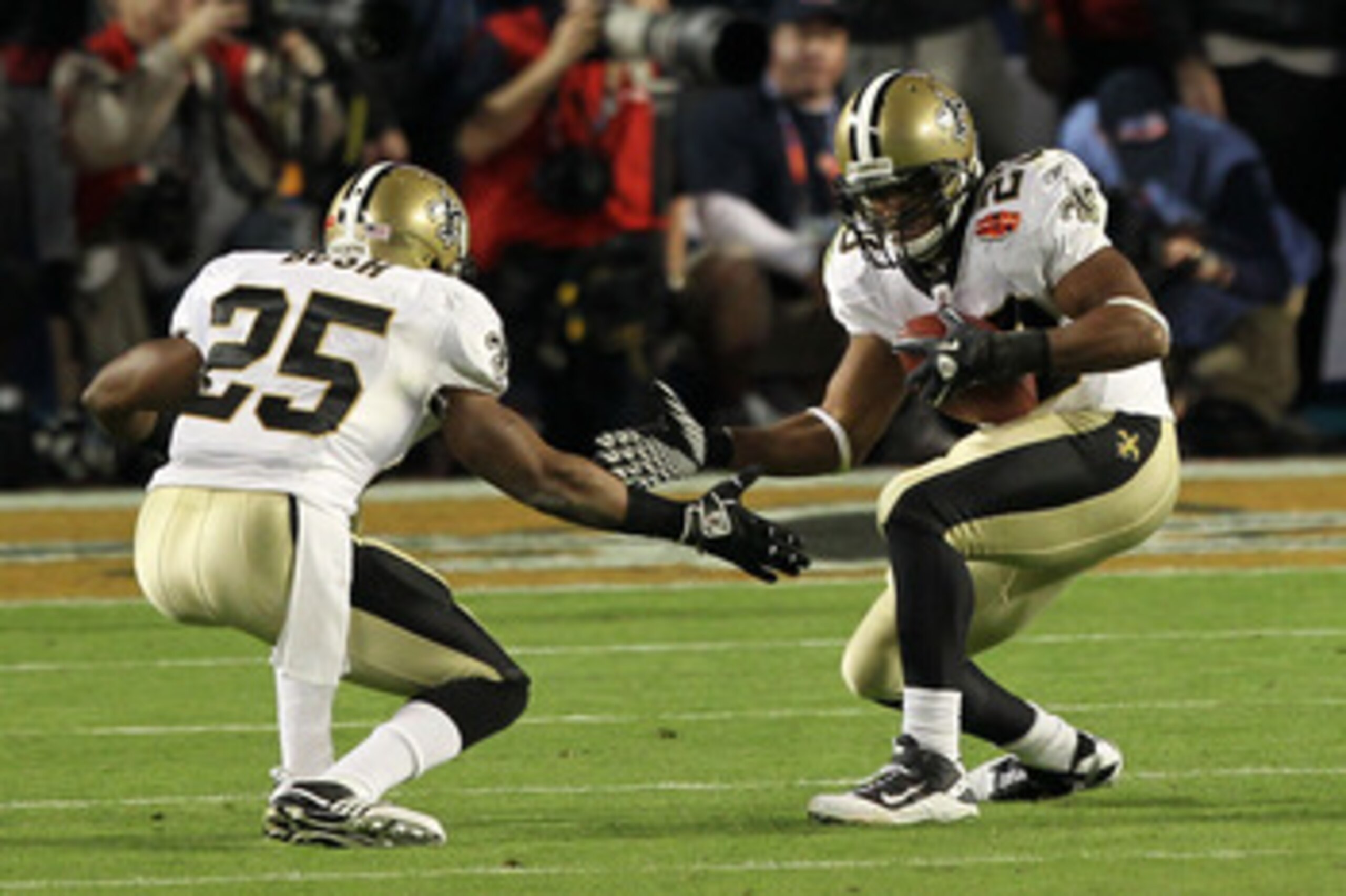 MIAMI GARDENS, FL - FEBRUARY 07: Reggie Bush #25 celebrates with Pierre Thomas #23 of the New Orleans Saints after Thomas' touchdown during Super Bowl XLIV on February 7, 2010 at Sun Life Stadium in Miami Gardens, Florida. (Photo by Ezra Shaw/Getty Ima MIAMI GARDENS, FL - FEBRUARY 07: Reggie Bush #25 celebrates with Pierre Thomas #23 of the New Orleans Saints after Thomas' touchdown during Super Bowl XLIV on February 7, 2010 at Sun Life Stadium in Miami Gardens, Florida. (Photo by Ezra Shaw/Getty Ima