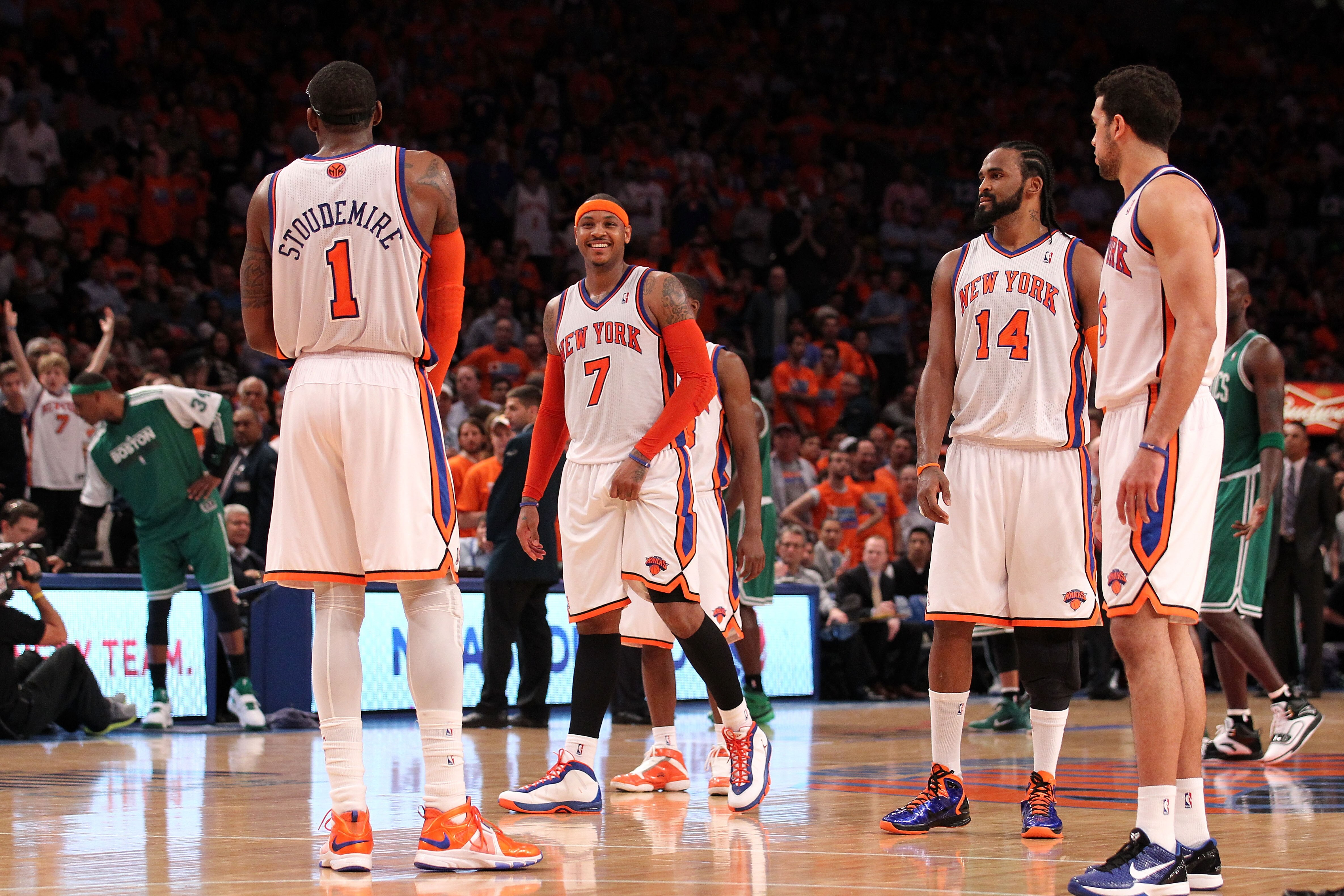 NEW YORK, NY - APRIL 24:  (L-R) Amar'e Stoudemire #1, Carmelo Anthony #7, Ronny Turiaf #14 and Landry Fields #6 of the New York Knicks look on against the Boston Celtics in Game Four of the Eastern Conference Quarterfinals during the 2011 NBA Playoffs on