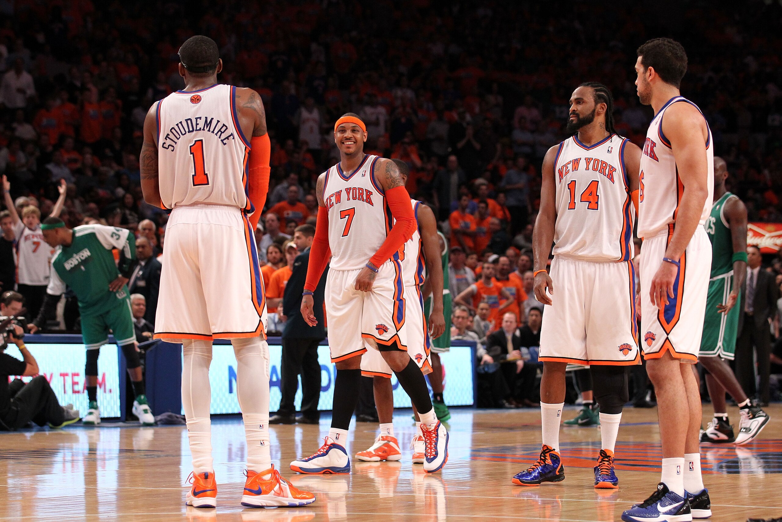 NEW YORK, NY - APRIL 24:  (L-R) Amar'e Stoudemire #1, Carmelo Anthony #7, Ronny Turiaf #14 and Landry Fields #6 of the New York Knicks look on against the Boston Celtics in Game Four of the Eastern Conference Quarterfinals during the 2011 NBA Playoffs on