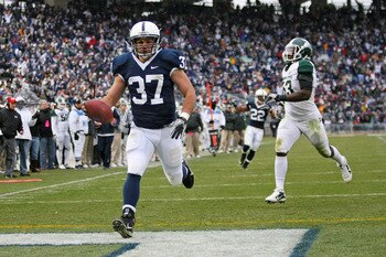 STATE COLLEGE, PA - NOVEMBER 27: Running back Joe Suhey #37 of the Penn State Nittany Lions scores a touchdown during a game against the Michigan State Spartans on November 27, 2010 at Beaver Stadium in State College, Pennsylvania. The Spartans won 28-22.