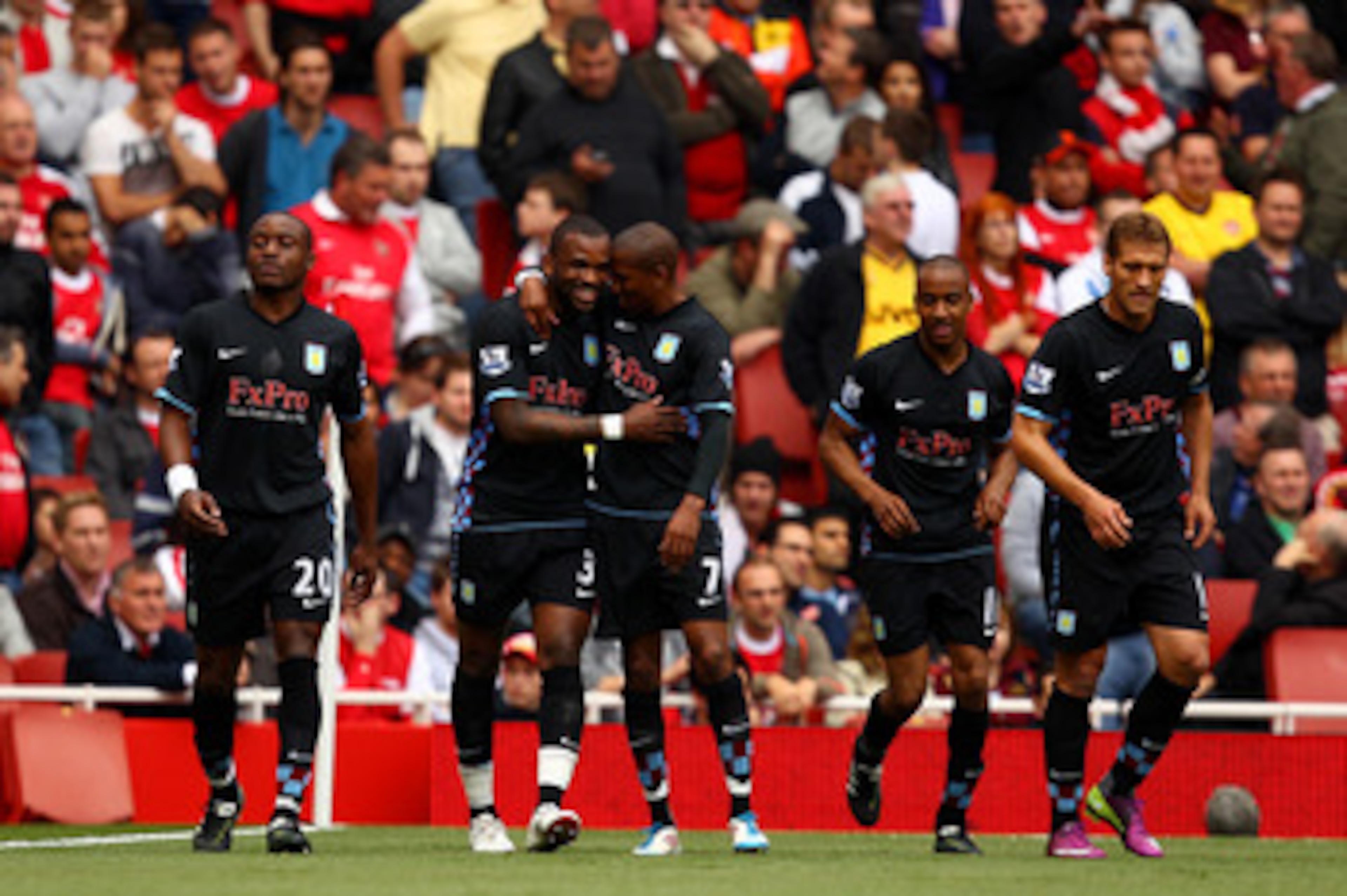 LONDON, ENGLAND - MAY 15:  Darren Bent (2nd L) of Aston Villa celebrates with team-mates (L-R) Nigel Reo-Coker, Ashley Young, Fabian Delph and Stiliyan Petrov after scoring a goal during the Barclays Premier League match between Arsenal and Aston Villa at
