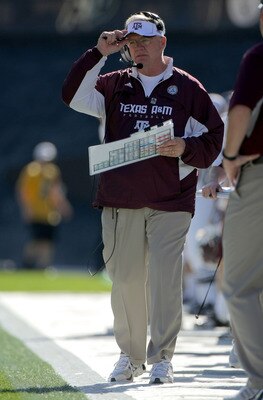 BOULDER, CO - NOVEMBER 07:  Head coach Mike Sherman of the Texas A&M Aggies leads his team against the Colorado Buffaloes during NCAA college football action at Folsom Field on November 7, 2009 in Boulder, Colorado. Colorado defeated Texas A&M 35-34.  (Ph