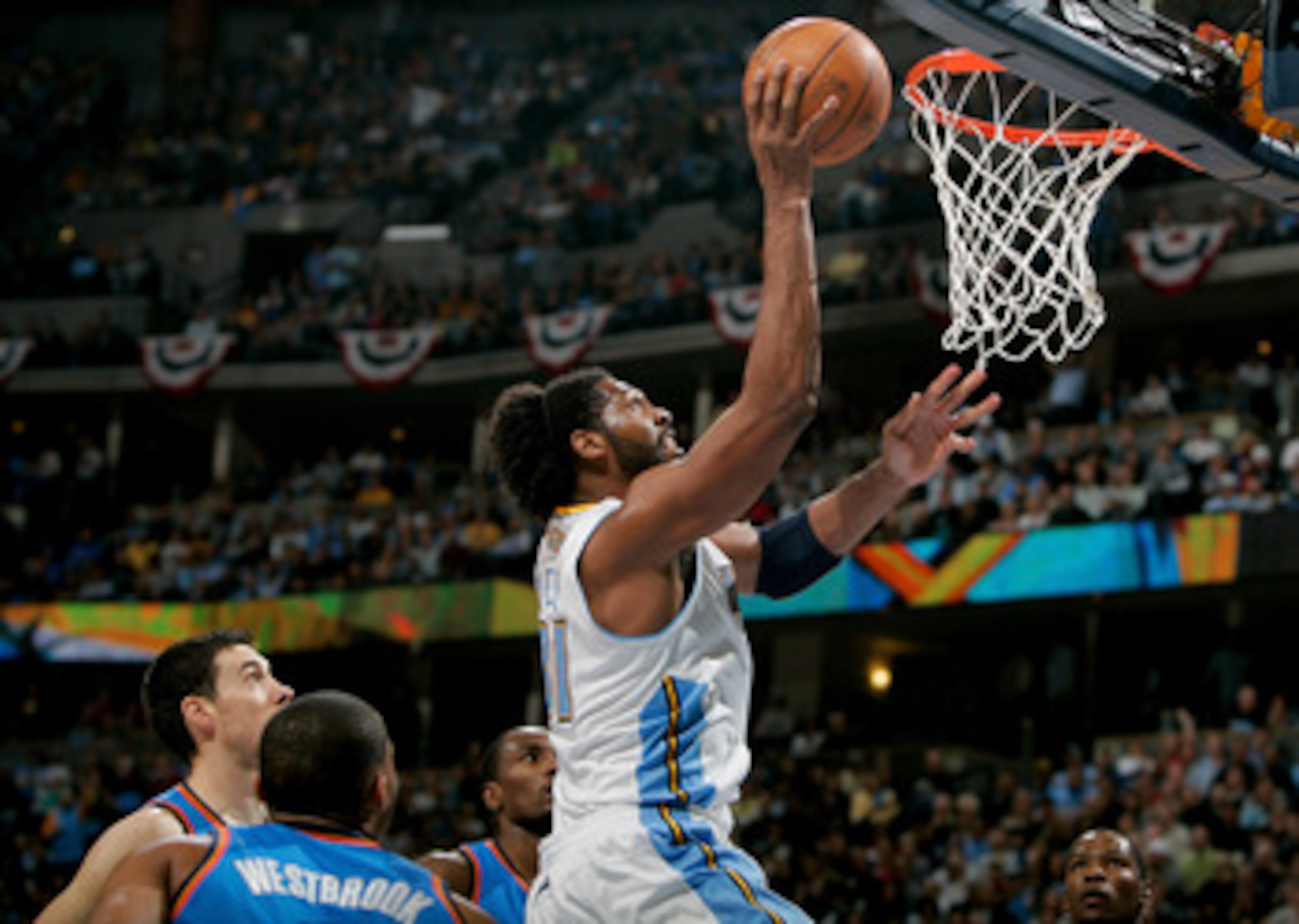 DENVER, CO - APRIL 23:  Nene #31 of the Denver Nuggets scores against the Oklahoma City Thunder in Game Three of the Western Conference Quarterfinals in the 2011 NBA Playoffs at Pepsi Center on April 23, 2011 in Denver, Colorado. NOTE TO USER: User expres