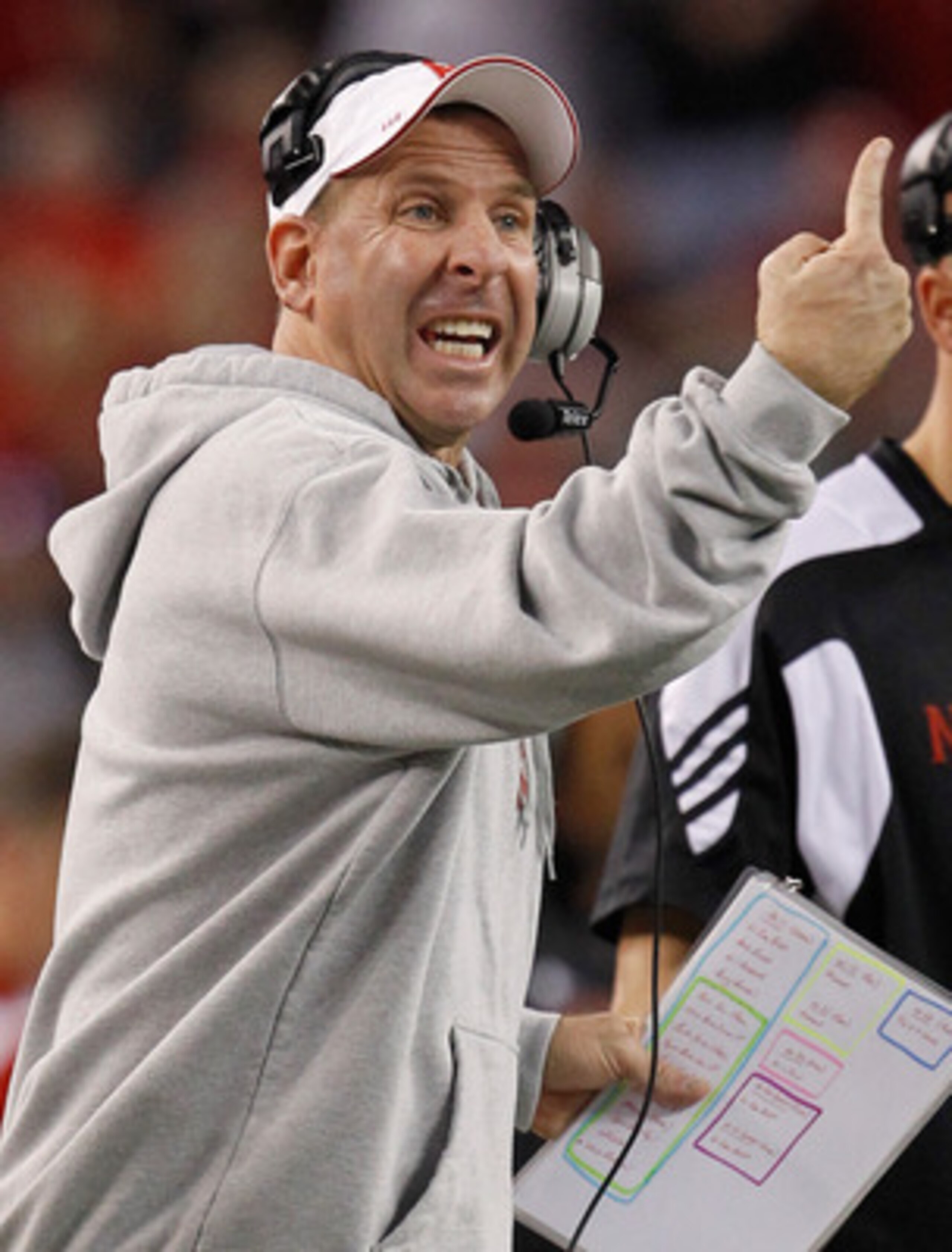 ARLINGTON, TX - DECEMBER 04:  Head coach Bo Pelini of the Nebraska Cornhuskers leads his team against the Oklahoma Sooners at Cowboys Stadium on December 4, 2010 in Arlington, Texas. The Sooners beat the Cornhuskers 23-20.  (Photo by Tom Pennington/Getty 