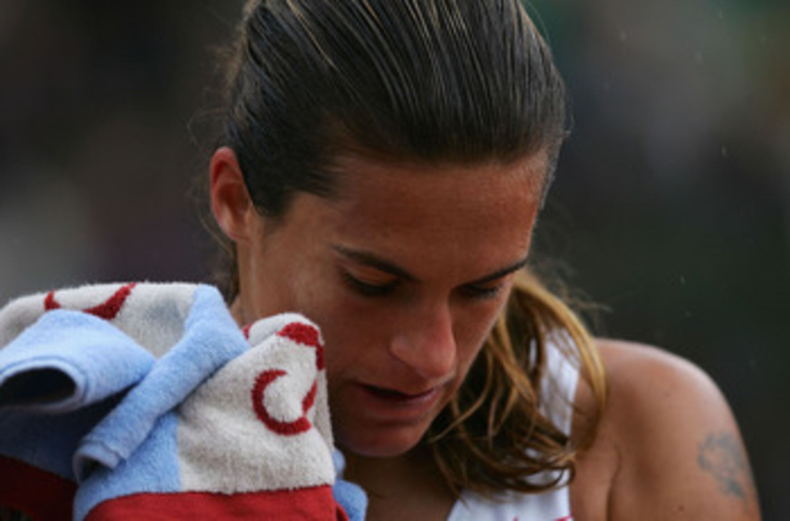 PARIS - JUNE 1:  Amelie Mauresmo of France after losing her quarterfinal match against Elena Dementieva of Russia during Day Nine of the 2004 French Open Tennis Championship at Roland Garros June 1, 2004 in Paris, France. (Photo by Clive Brunskill/Getty I
