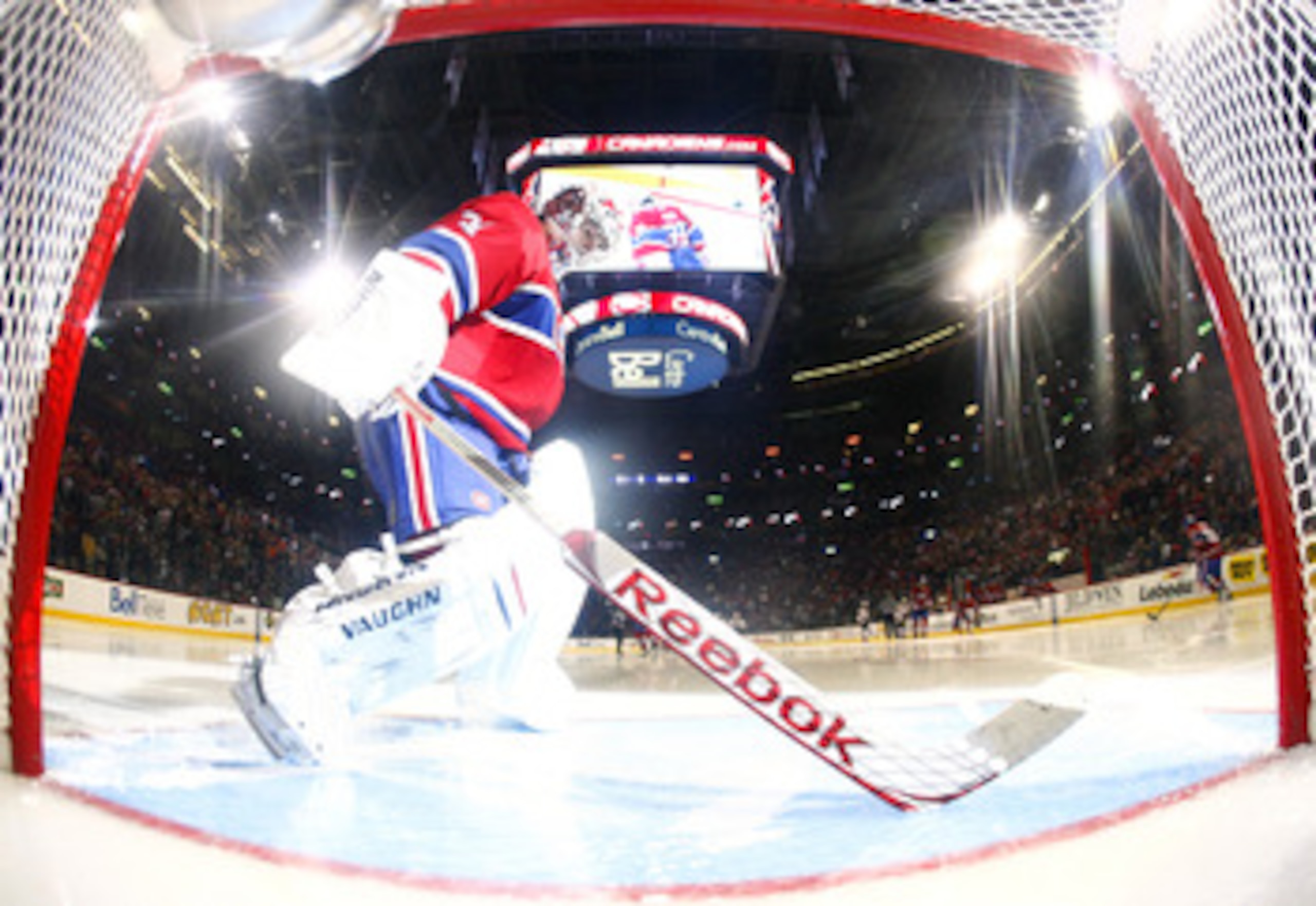 MONTREAL, CANADA - APRIL 26:  Carey Price #31 of the Montreal Canadiens prepares his crease at the start of the third period in Game Six of the Eastern Conference Quarterfinals against the Boston Bruins during the 2011 NHL Stanley Cup Playoffs at the Bell