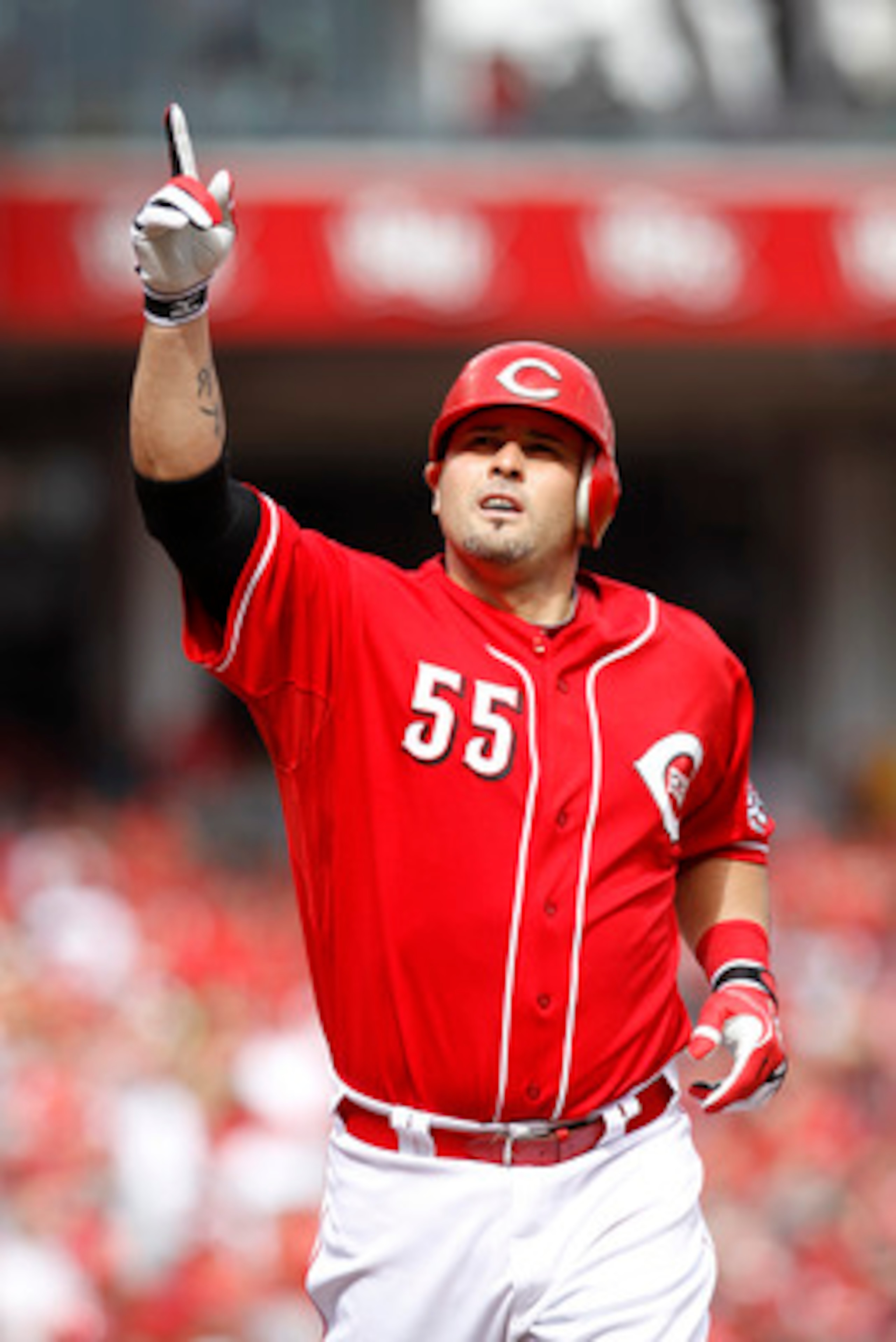 CINCINNATI, OH - MAY 14: Ramon Hernandez #55 of the Cincinnati Reds celebrates in the third inning after hitting the first of his two home runs against the St. Louis Cardinals at Great American Ball Park on May 14, 2011 in Cincinnati, Ohio. The Reds defea
