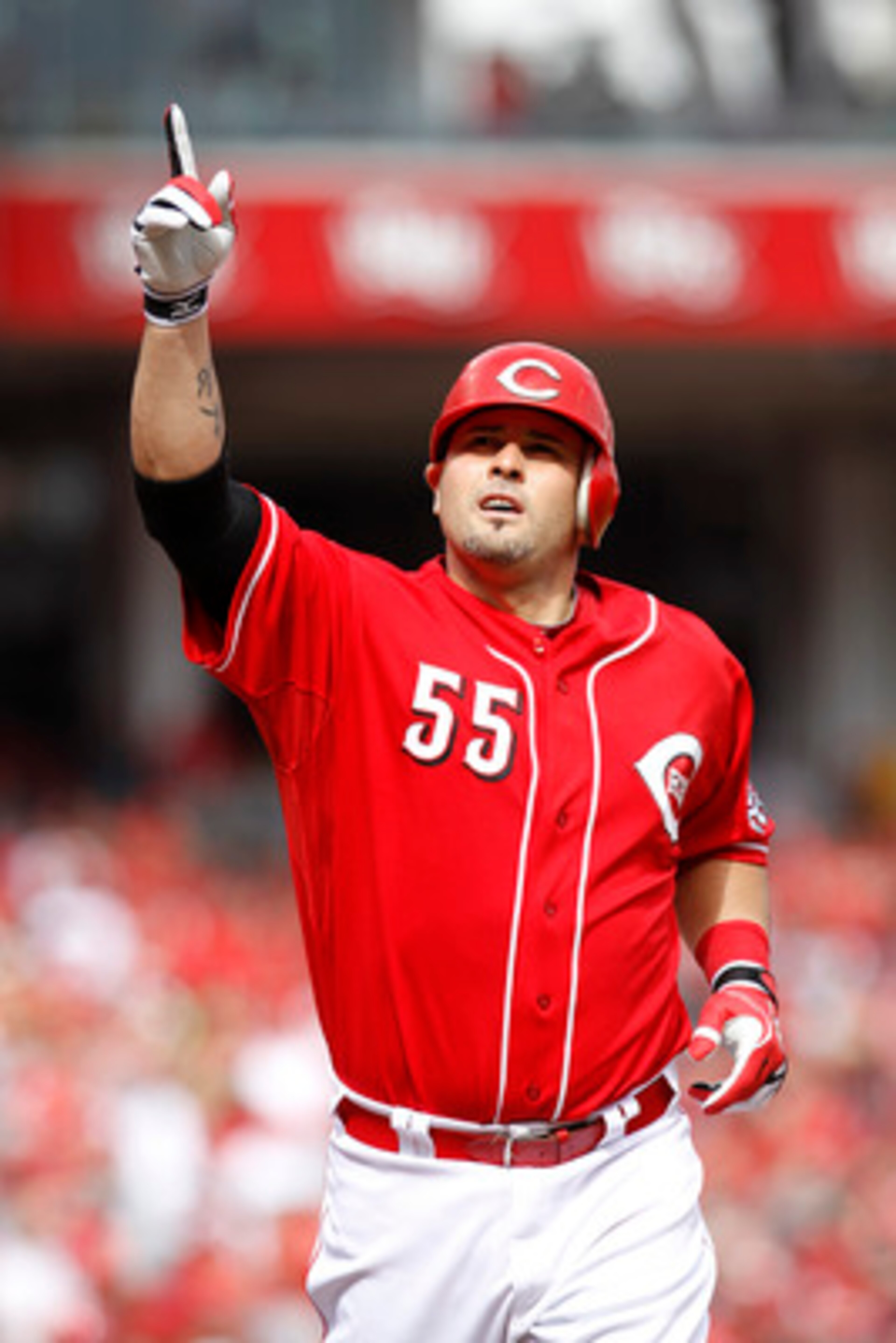 CINCINNATI, OH - MAY 14: Ramon Hernandez #55 of the Cincinnati Reds celebrates in the third inning after hitting the first of his two home runs against the St. Louis Cardinals at Great American Ball Park on May 14, 2011 in Cincinnati, Ohio. The Reds defea