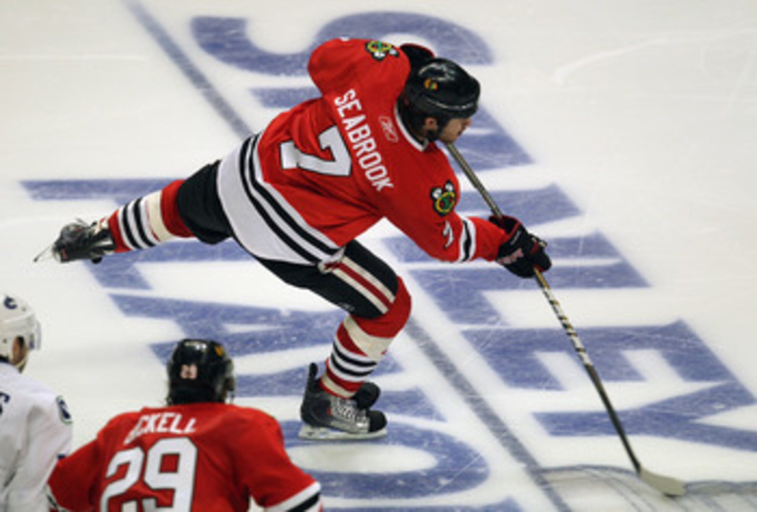 CHICAGO, IL - APRIL 24: Brent Seabrook #7 of the Chicago Blackhawks fires the puck against the Vancouver Canucks in Game Six of the Western Conference Quarterfinals during the 2011 NHL Stanley Cup Playoffs at the United Center on April 24, 2011 in Chicago