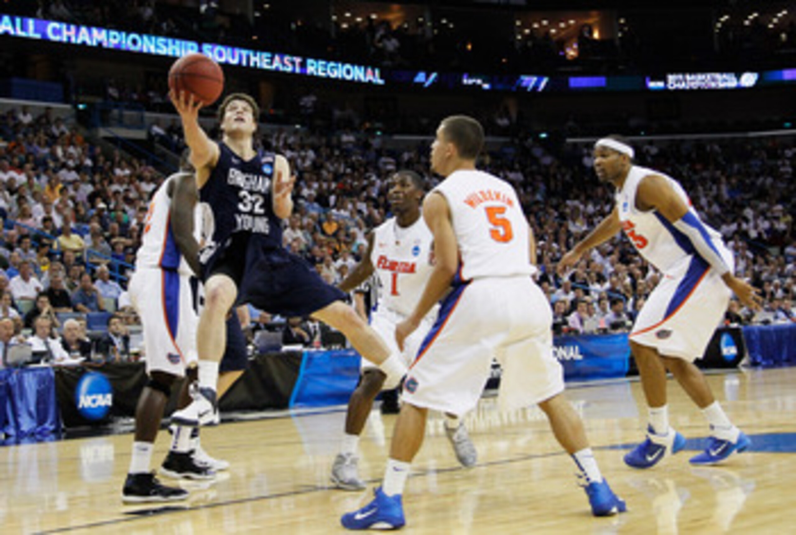 NEW ORLEANS, LA - MARCH 24:  Jimmer Fredette #32 of the Brigham Young Cougars shoots against the Florida Gators during the Southeast regional of the 2011 NCAA men's basketball tournament at New Orleans Arena on March 24, 2011 in New Orleans, Louisiana.  (