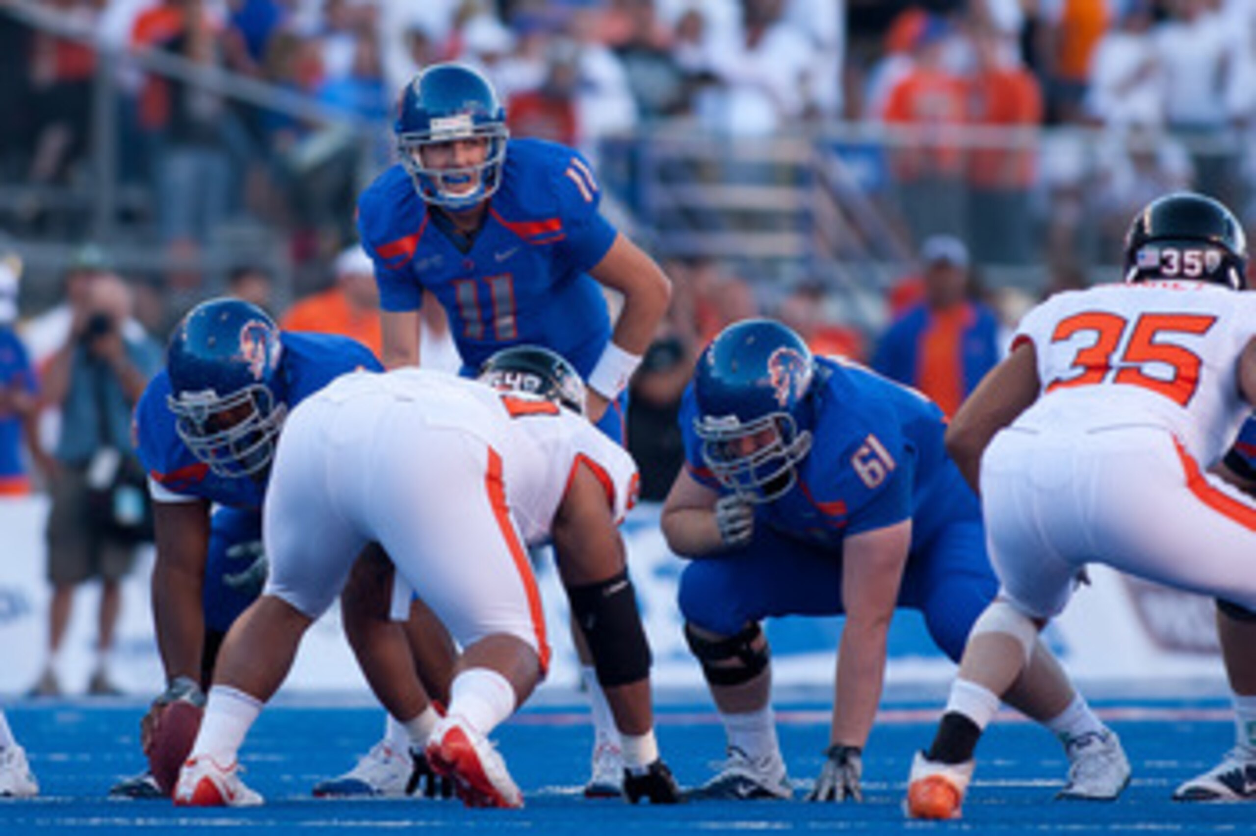 BOISE, ID - SEPTEMBER 25:  Quarterback Kellen Moore #11 of the Boise State Broncos calls a play against the Oregon State Beavers at Bronco Stadium on September 25, 2010 in Boise, Idaho.  (Photo by Otto Kitsinger III/Getty Images)