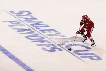 GLENDALE, AZ - APRIL 18:  Keith Yandle #3 of the Phoenix Coyotes skates with the puck in Game Three of the Western Conference Quarterfinals against the Detroit Red Wings during the 2011 NHL Stanley Cup Playoffs at Jobing.com Arena on April 18, 2011 in Gle