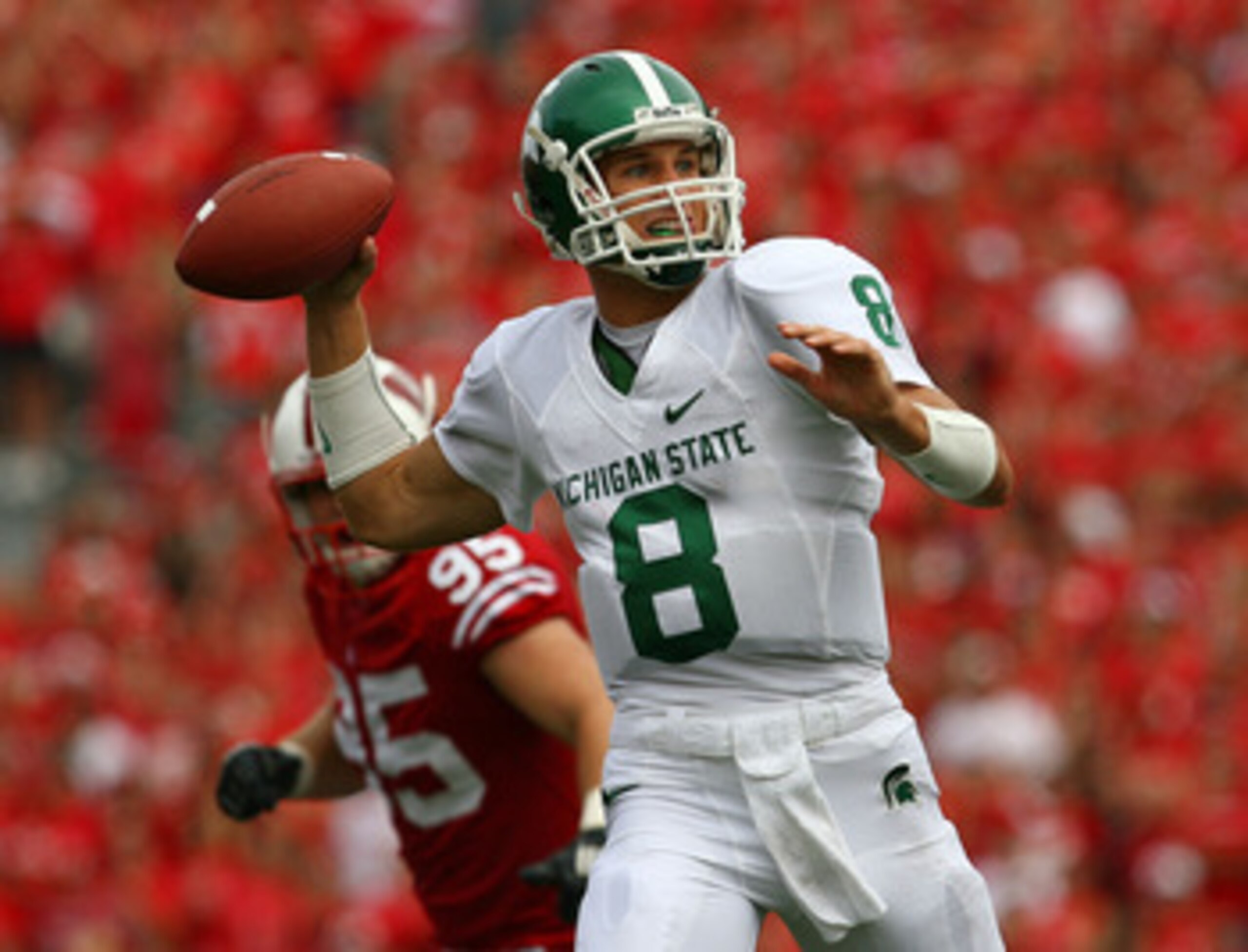 MADISON, WI - SEPTEMBER 26:  Kirk Cousins #8 of the Michigan State Spartans passes the ball against the Wisconsin Badgers on September 26, 2009 at Camp Randall Stadium in Madison, Wisconsin.  (Photo by Jonathan Daniel/Getty Images)