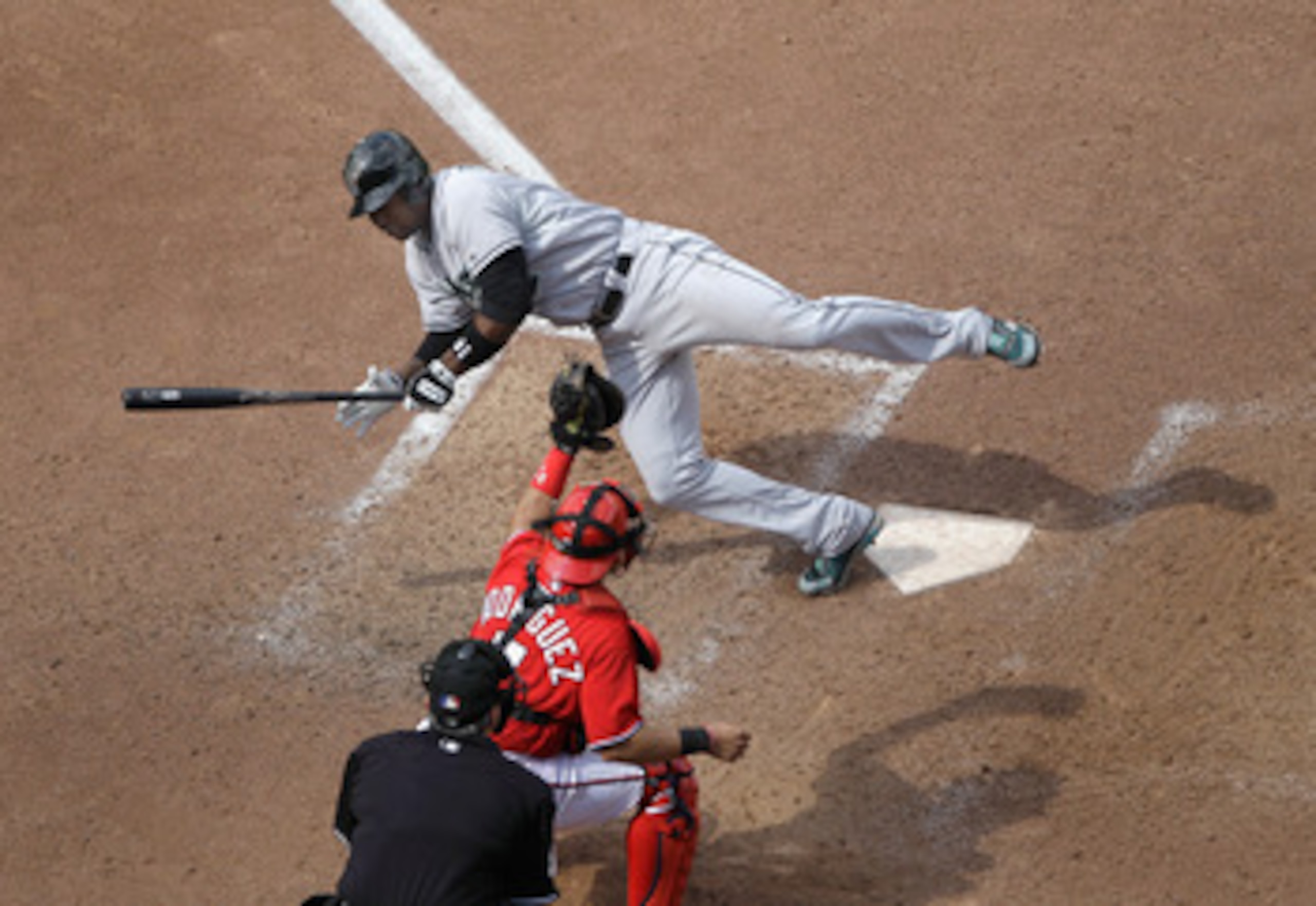 WASHINGTON, DC - MAY 15: Hanley Ramirez #2 of the Florida Marlins is brushed back by a pitch during the seventh inning as catcher Ivan Rodriguez #7 of the Washington Nationals holds onto the ball at Nationals Park on May 15, 2011 in Washington, DC.  (Phot