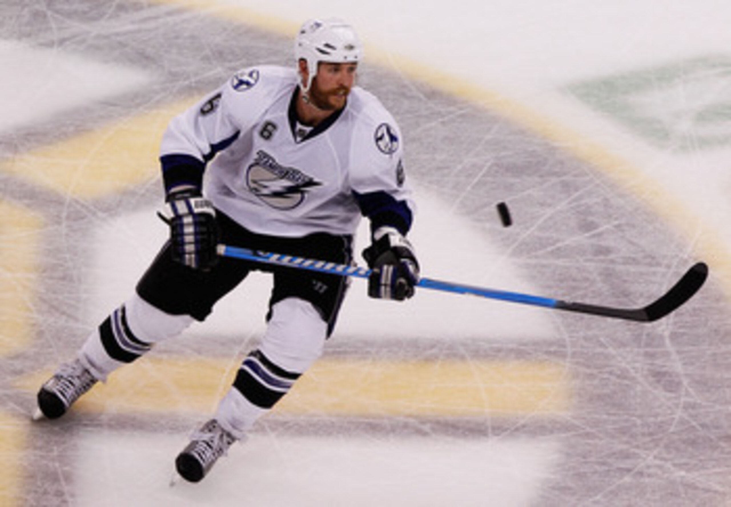 BOSTON, MA - MAY 14:  Ryan Malone #6 of the Tampa Bay Lightning controls the puck against the Boston Bruins in Game One of the Eastern Conference Finals during the 2011 NHL Stanley Cup Playoffs at TD Garden on May 14, 2011 in Boston, Massachusetts.  (Phot