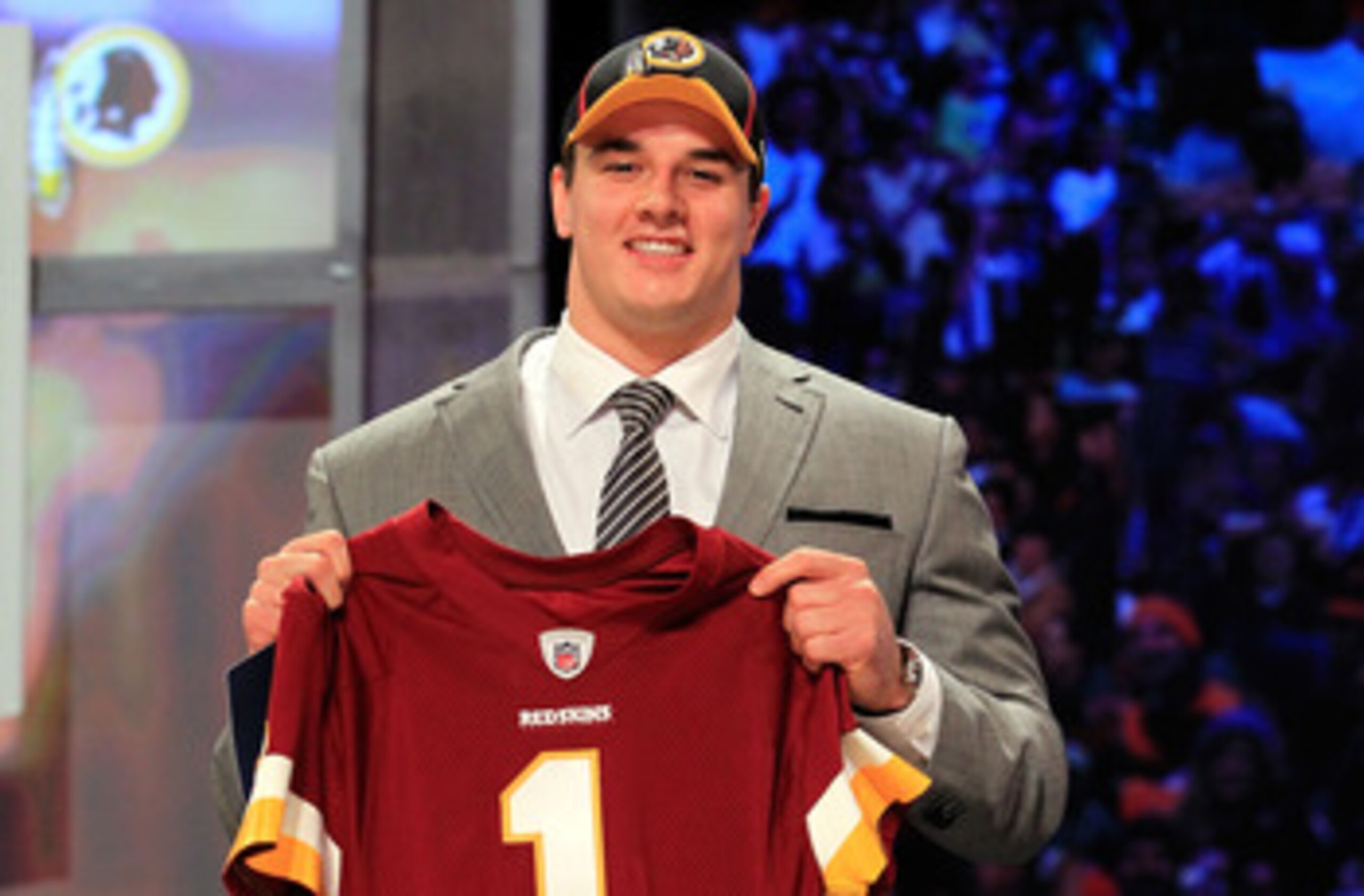 NEW YORK, NY - APRIL 28:  Ryan Kerrigan, #16 overall pick by the Washington Redskins, holds up a jersey on stage during the 2011 NFL Draft at Radio City Music Hall on April 28, 2011 in New York City.  (Photo by Chris Trotman/Getty Images)