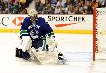VANCOUVER, CANADA - MAY 18: Goaltender Roberto Luongo #1 of the Vancouver Canucks makes a save in the first period in Game Two of the Western Conference Finals against the San Jose Sharks  during the 2011 Stanley Cup Playoffs at Rogers Arena on May 18, 20