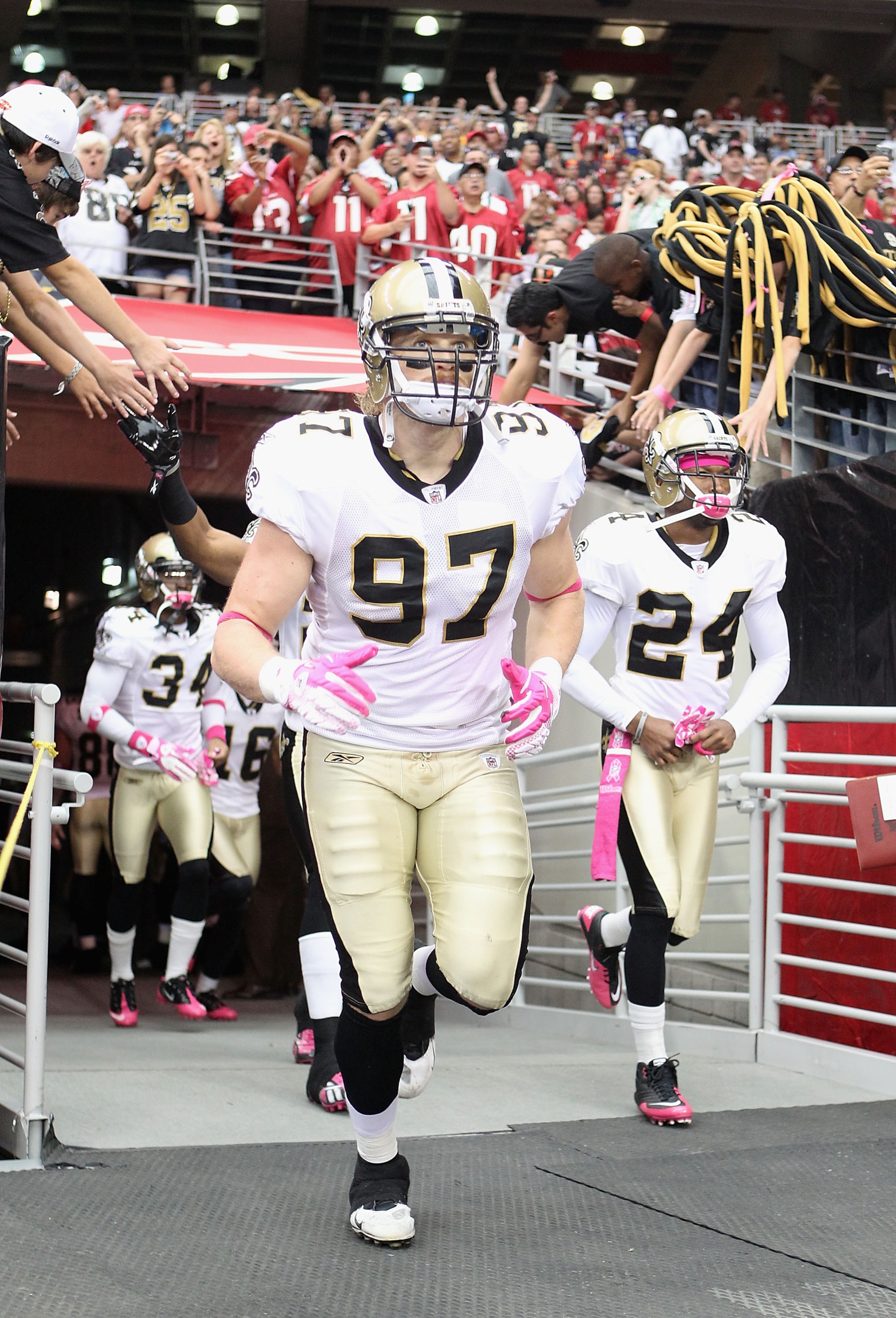 GLENDALE, AZ - OCTOBER 10: Defensive end Jeff Charleston #97 of the New Orleans Saints runs out onto the field before the NFL game against the Arizona Cardinals at the University of Phoenix Stadium on October 10, 2010 in Glendale, Arizona. (Photo by Chr GLENDALE, AZ - OCTOBER 10: Defensive end Jeff Charleston #97 of the New Orleans Saints runs out onto the field before the NFL game against the Arizona Cardinals at the University of Phoenix Stadium on October 10, 2010 in Glendale, Arizona. (Photo by Chr
