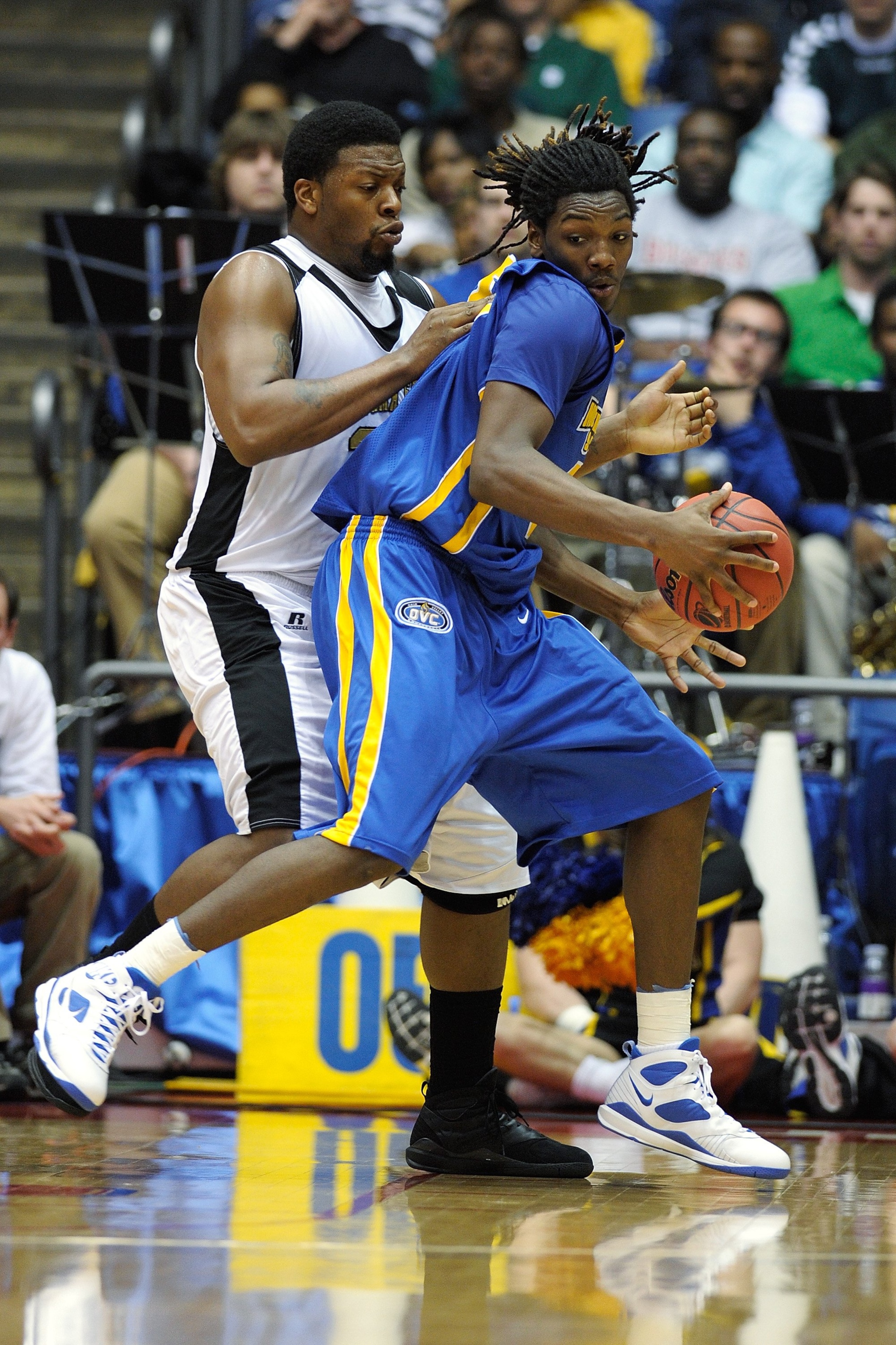 DAYTON, OH - MARCH 17:  Kenneth Faried #35 of the Morehead State Eagles attempts to drive against Roland Fitch #34 of the Alabama State Hornets during the opening round of the Men's NCAA Tournament on March 17, 2009 at the University of Dayton Arena in Da