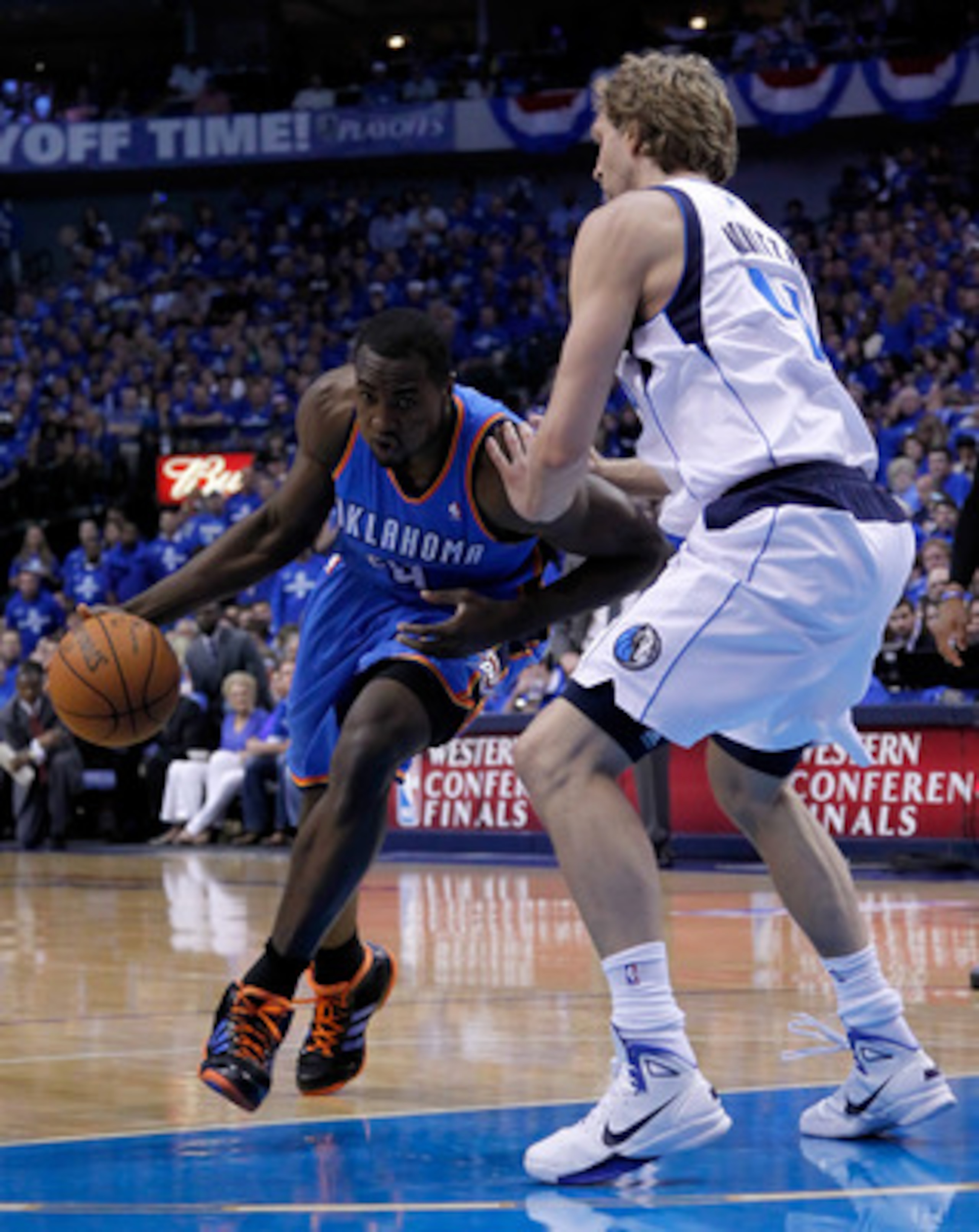 DALLAS, TX - MAY 17:  Serge Ibaka #9 of the Oklahoma City Thunder drives on Dirk Nowitzki #41 of the Dallas Mavericks in Game One of the Western Conference Finals during the 2011 NBA Playoffs at American Airlines Center on May 17, 2011 in Dallas, Texas. N