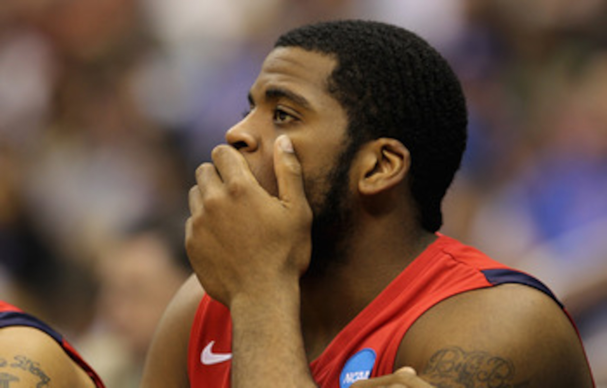 SAN ANTONIO, TX - MARCH 25:  Derrick Williams #34 of the Richmond Spiders reacts during the southwest regional of the 2011 NCAA men's basketball tournament against the Kansas Jayhawks at the Alamodome on March 25, 2011 in San Antonio, Texas. Kansas defeat