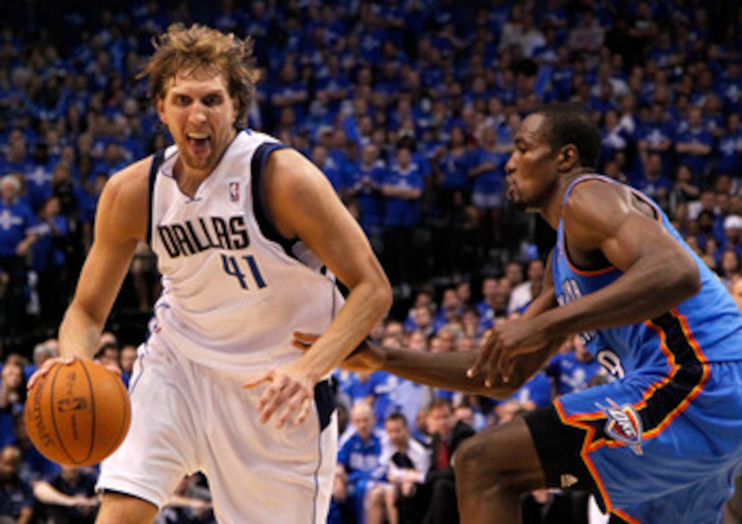DALLAS, TX - MAY 17:  Dirk Nowitzki #41 of the Dallas Mavericks drives on Serge Ibaka #9 of the Oklahoma City Thunder in Game One of the Western Conference Finals during the 2011 NBA Playoffs at American Airlines Center on May 17, 2011 in Dallas, Texas. N