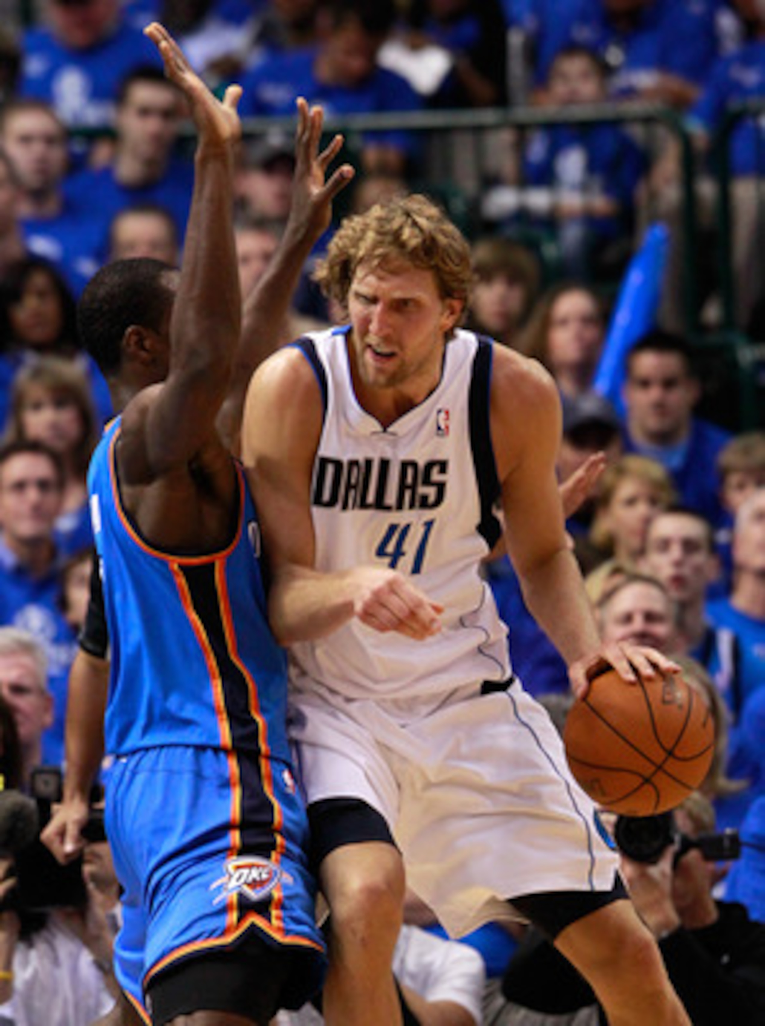 DALLAS, TX - MAY 17:  Dirk Nowitzki #41 of the Dallas Mavericks backs down Serge Ibaka #9 of the Oklahoma City Thunder in Game One of the Western Conference Finals during the 2011 NBA Playoffs at American Airlines Center on May 17, 2011 in Dallas, Texas. 