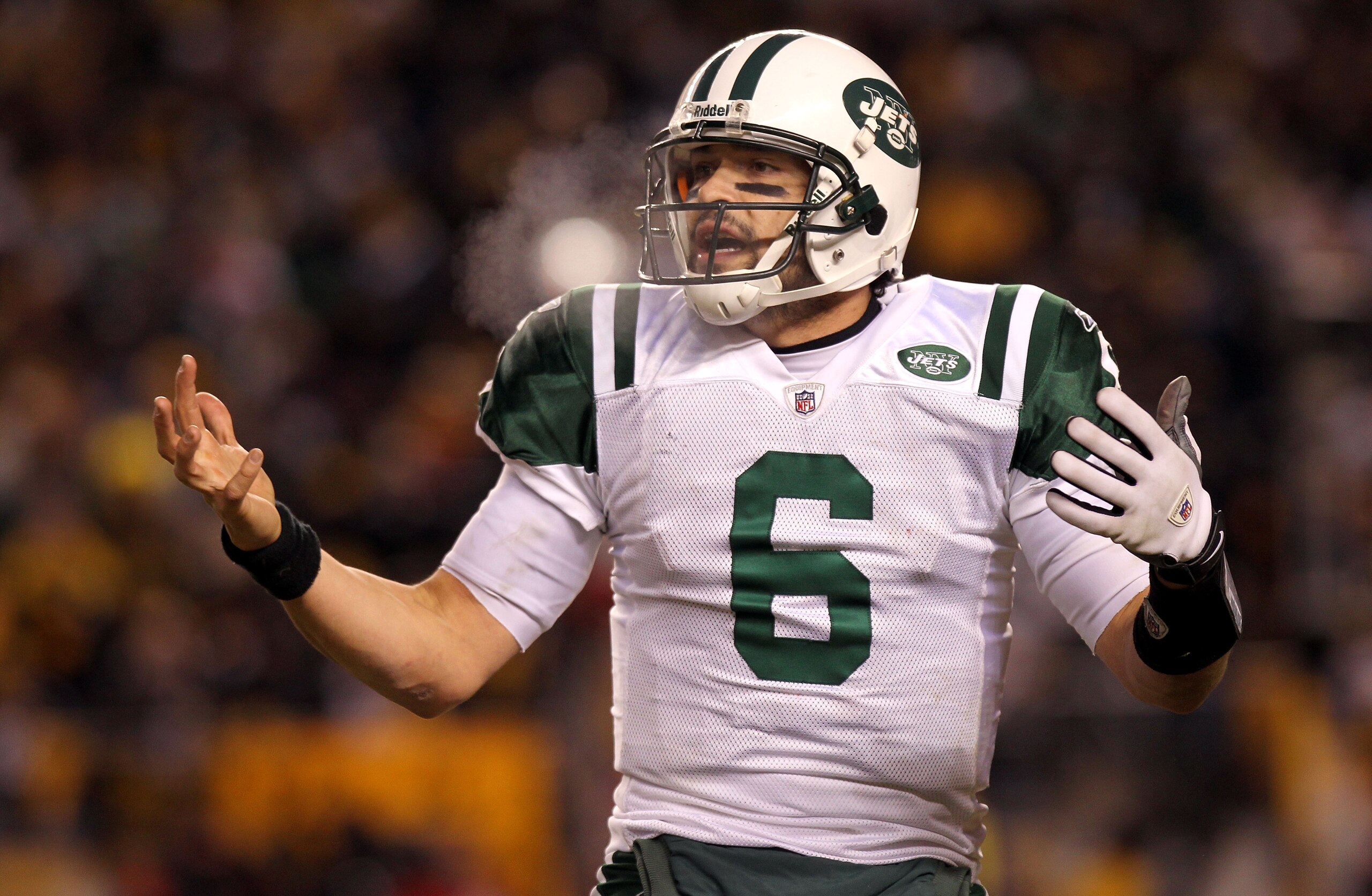 PITTSBURGH, PA - JANUARY 23:  Quarterback Mark Sanchez #6 of the New York Jets gestures as he looks towards the sideline against the Pittsburgh Steelers during the 2011 AFC Championship game at Heinz Field on January 23, 2011 in Pittsburgh, Pennsylvania.
