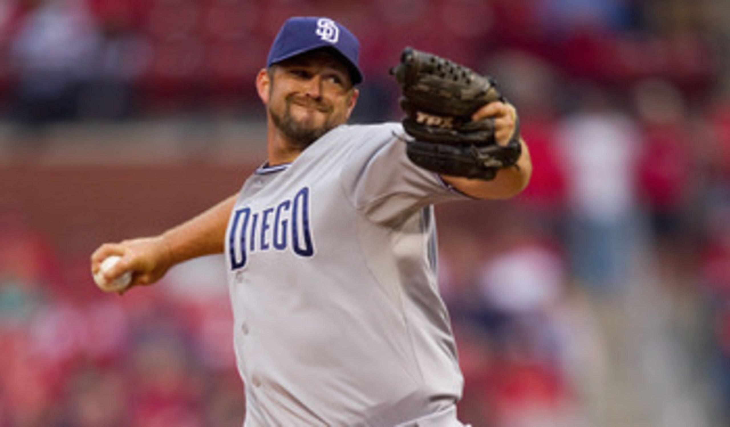 ST. LOUIS, MO - MARCH 31: Reliever Heath Bell #21 of the San Diego Padres pitches against the St. Louis Cardinals on opening day at Busch Stadium on March 31, 2011 in St. Louis, Missouri.  (Photo by Dilip Vishwanat/Getty Images)