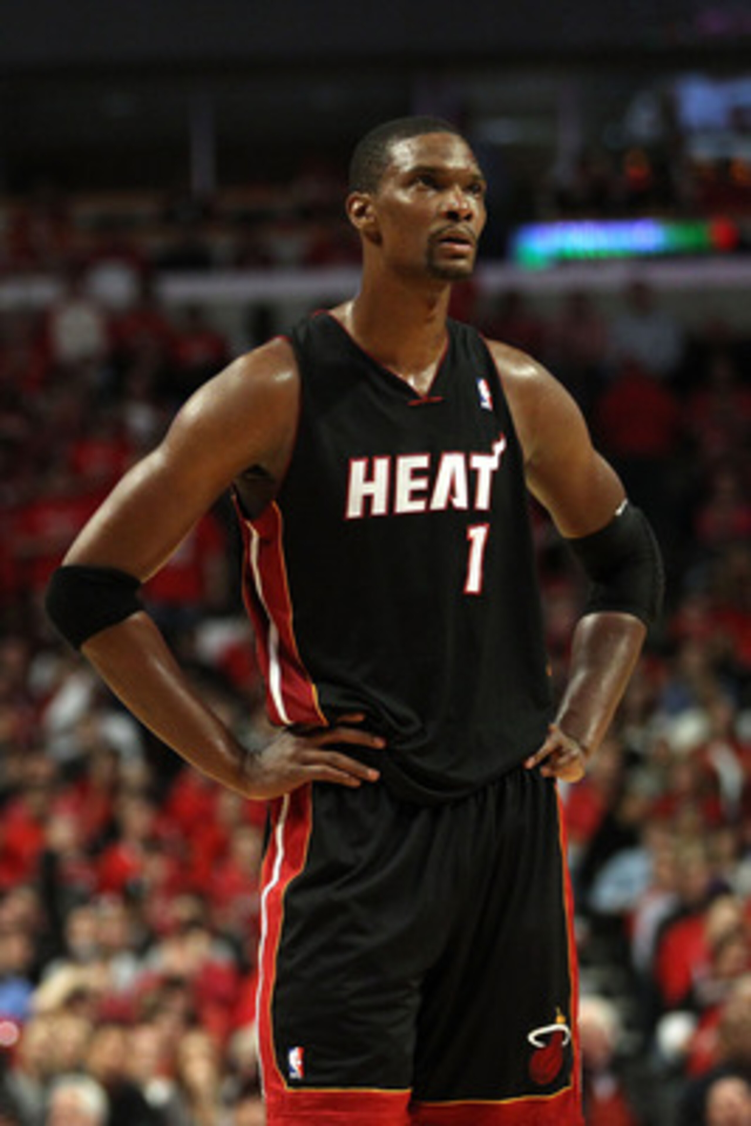 CHICAGO, IL - MAY 15:  Chris Bosh #1 of the Miami Heat looks on against the Chicago Bulls in Game One of the Eastern Conference Finals during the 2011 NBA Playoffs on May 15, 2011 at the United Center in Chicago, Illinois. The Bulls won 103-82. NOTE TO US