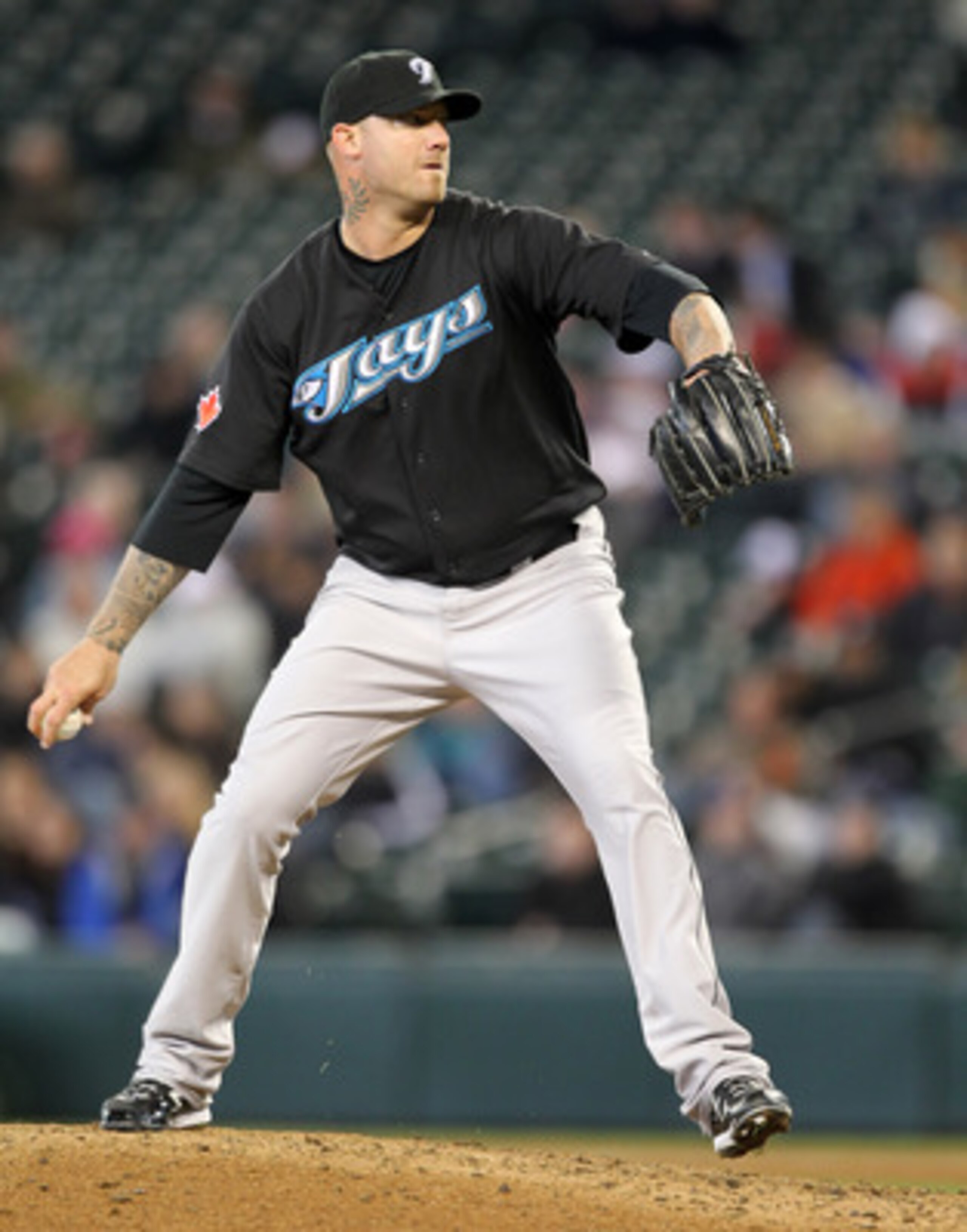 SEATTLE, WA - APRIL 13:  Relief pitcher Jon Rauch #60 of the Toronto Blue Jays pitches against the Seattle Mariners at Safeco Field on April 13, 2011 in Seattle, Washington. (Photo by Otto Greule Jr/Getty Images)