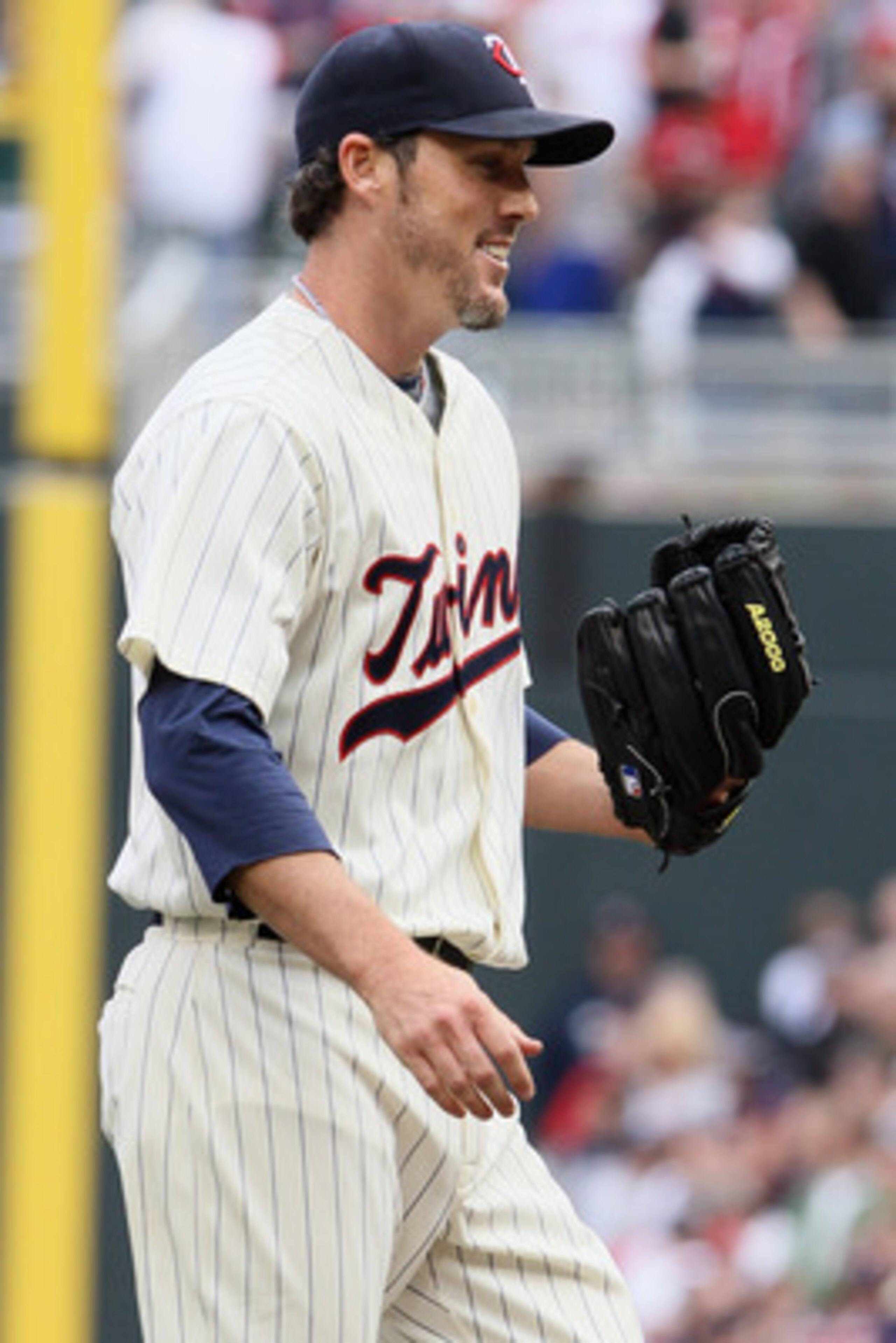 MINNEAPOLIS, MN - APRIL 08:  Closing pitcher Joe Nathan #36 of the Minnesota Twins celebrates the win during Opening Day on April 8, 2011 at Target Field in Minneapolis, Minnesota. The Minnesota Twins defeated the Oakland Athletics 2-1.  (Photo by Elsa/Ge